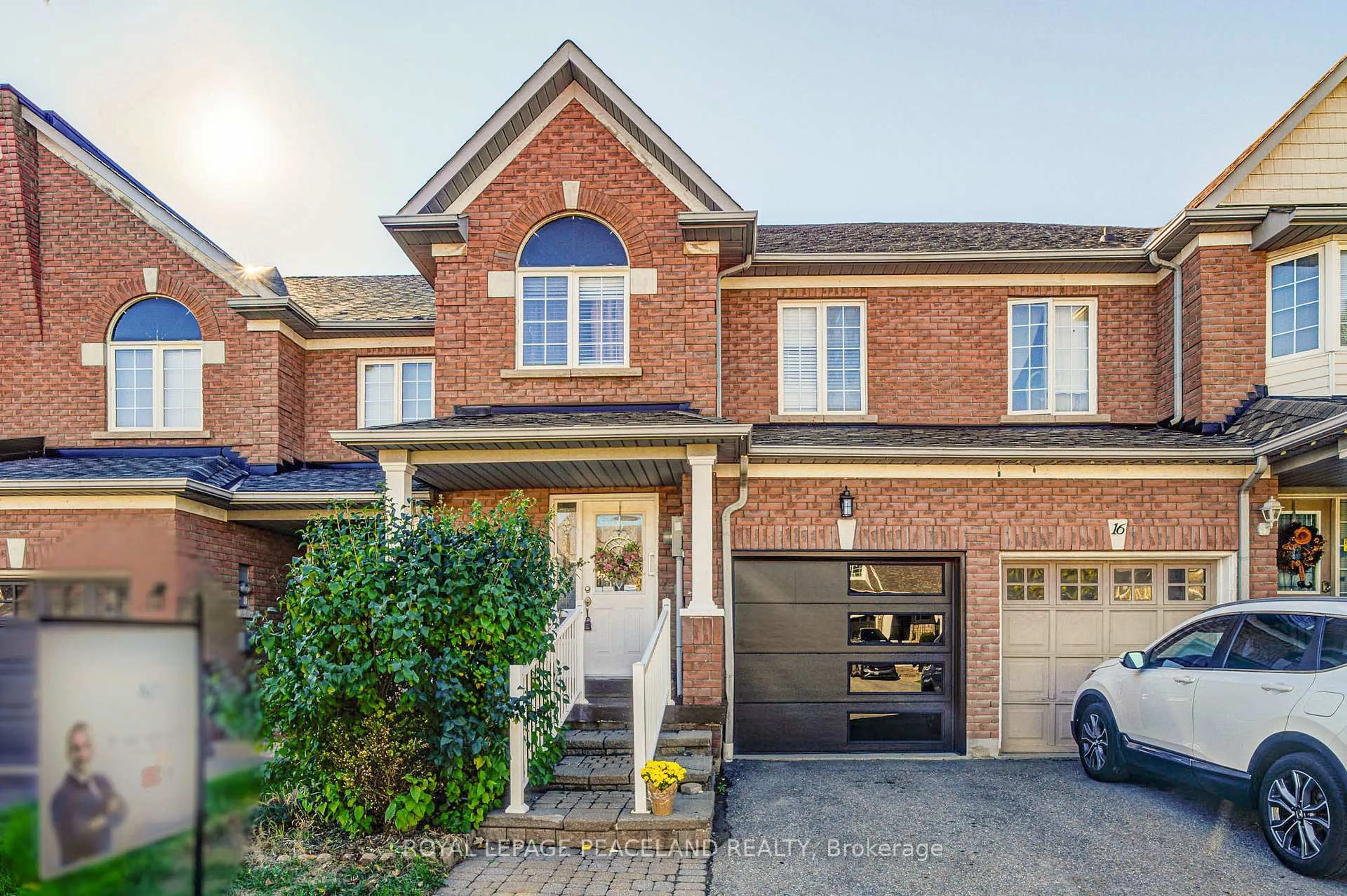 Home with brick exterior material, street for 14 Oglevie Dr, Whitby Ontario L1R 2Y4