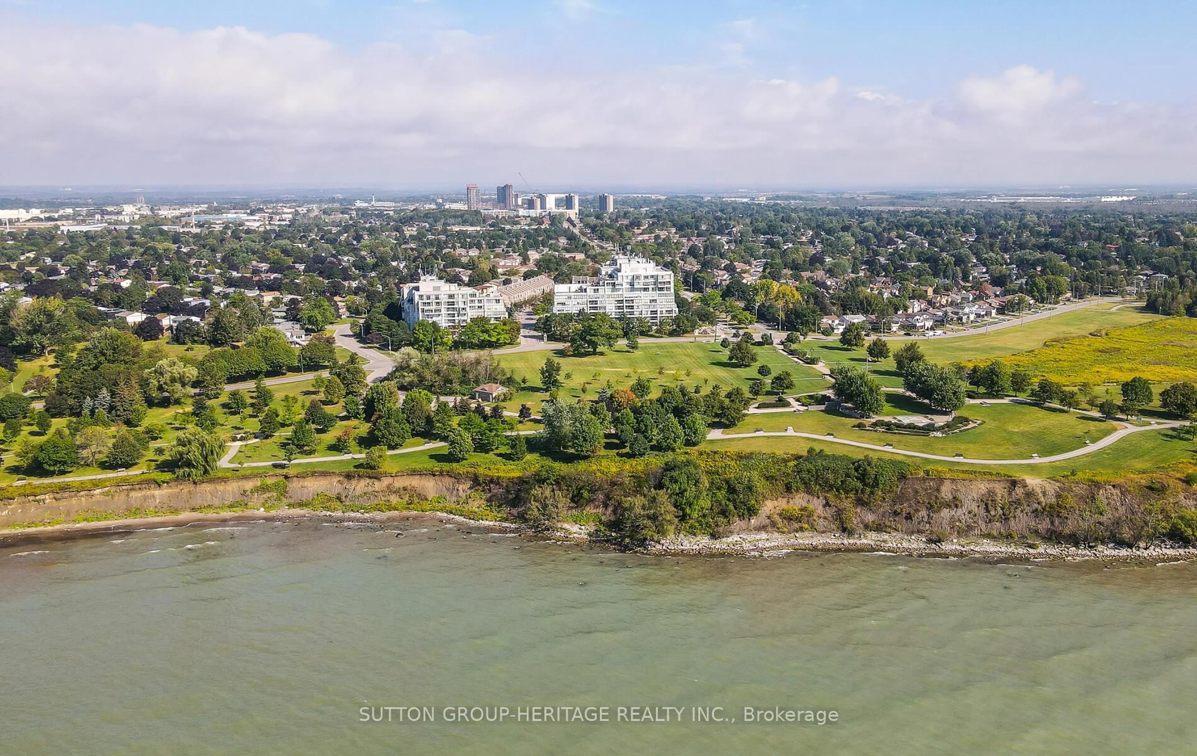 A pic from outside/outdoor area/front of a property/back of a property/a pic from drone, water/lake/river/ocean view for 45 Cumberland Lane #311, Ajax Ontario L1S 7K3