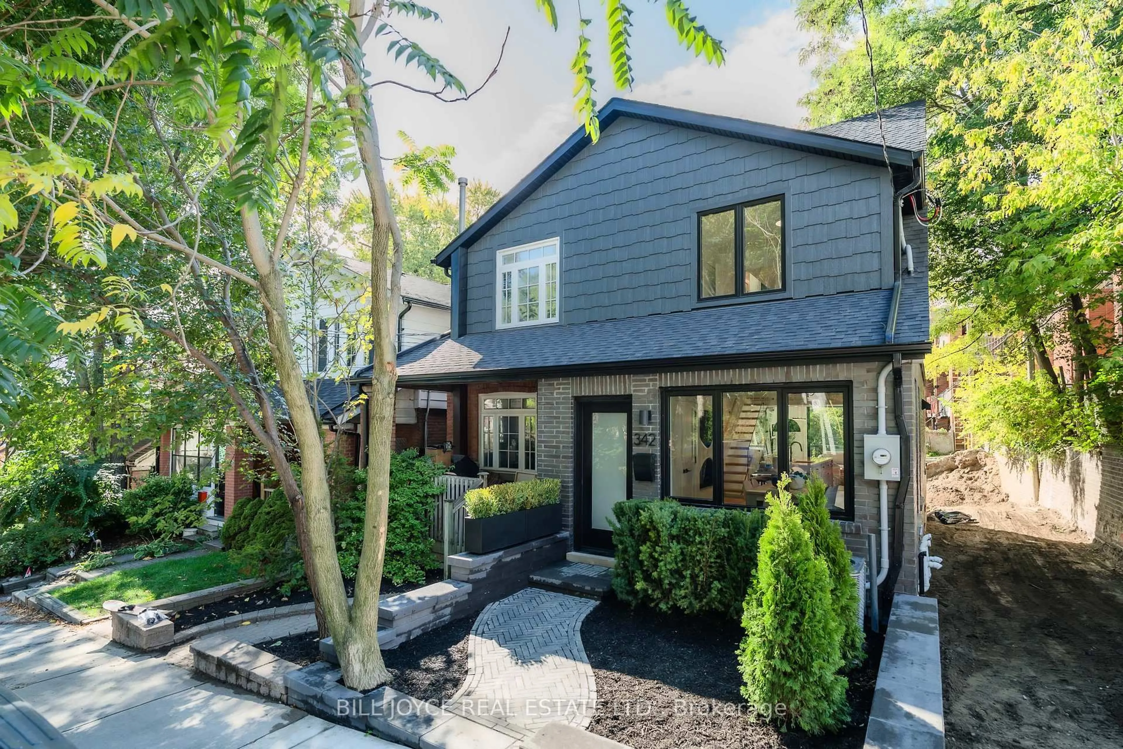Home with brick exterior material, street for 342 Lee Ave, Toronto Ontario M4E 2P8