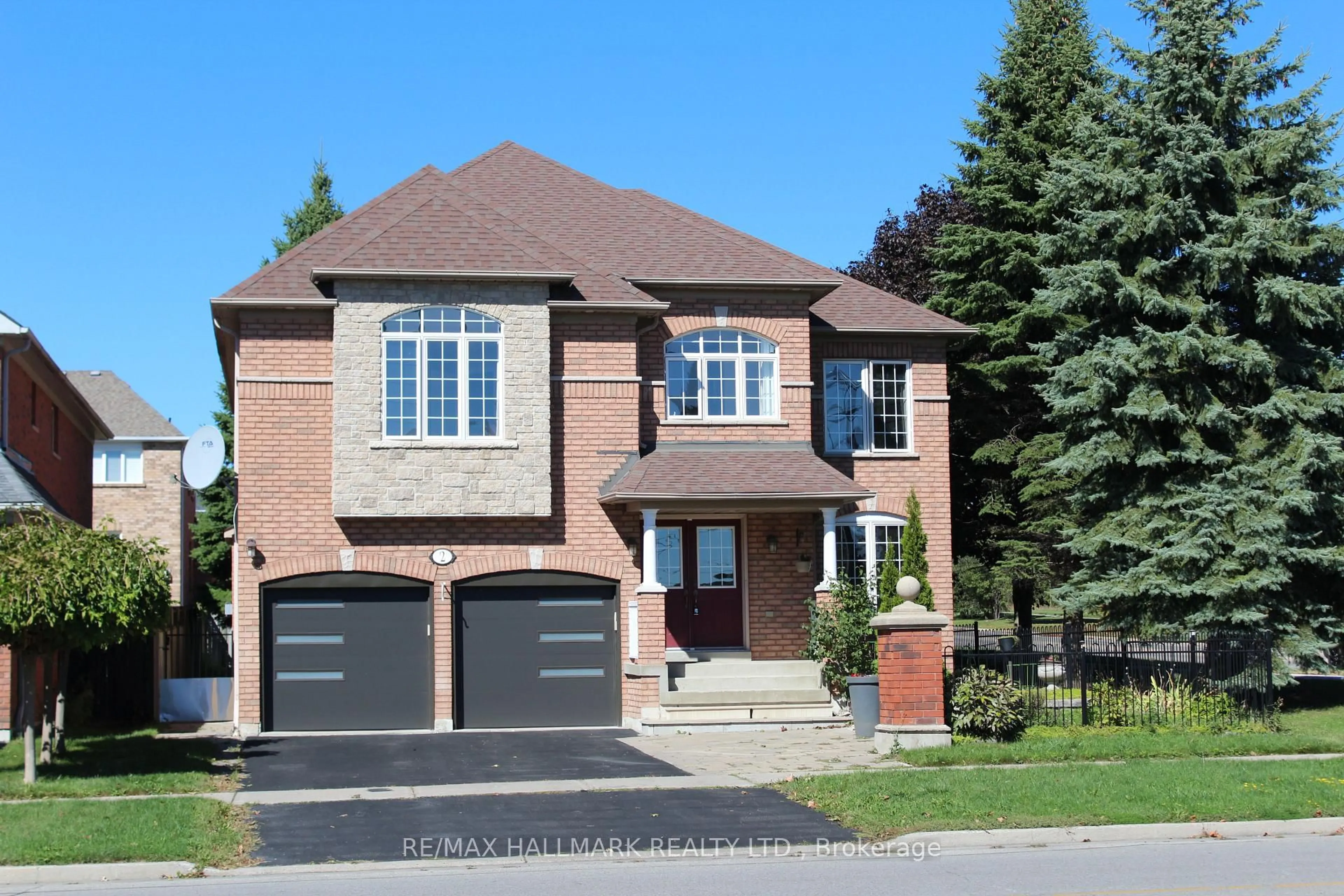 Home with brick exterior material, street for 2 Twin Streams Rd, Whitby Ontario L1P 1P1