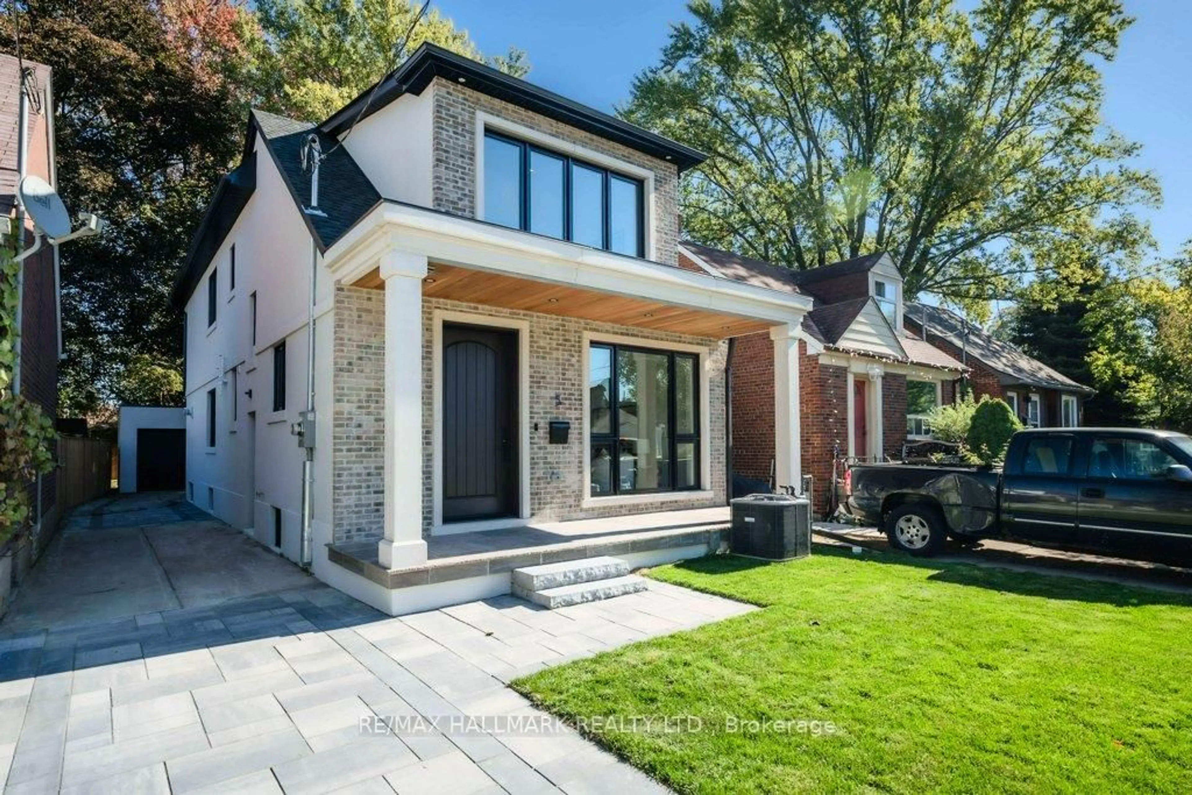 Home with brick exterior material, street for 5 Rednor Rd, Toronto Ontario M4C 4B3