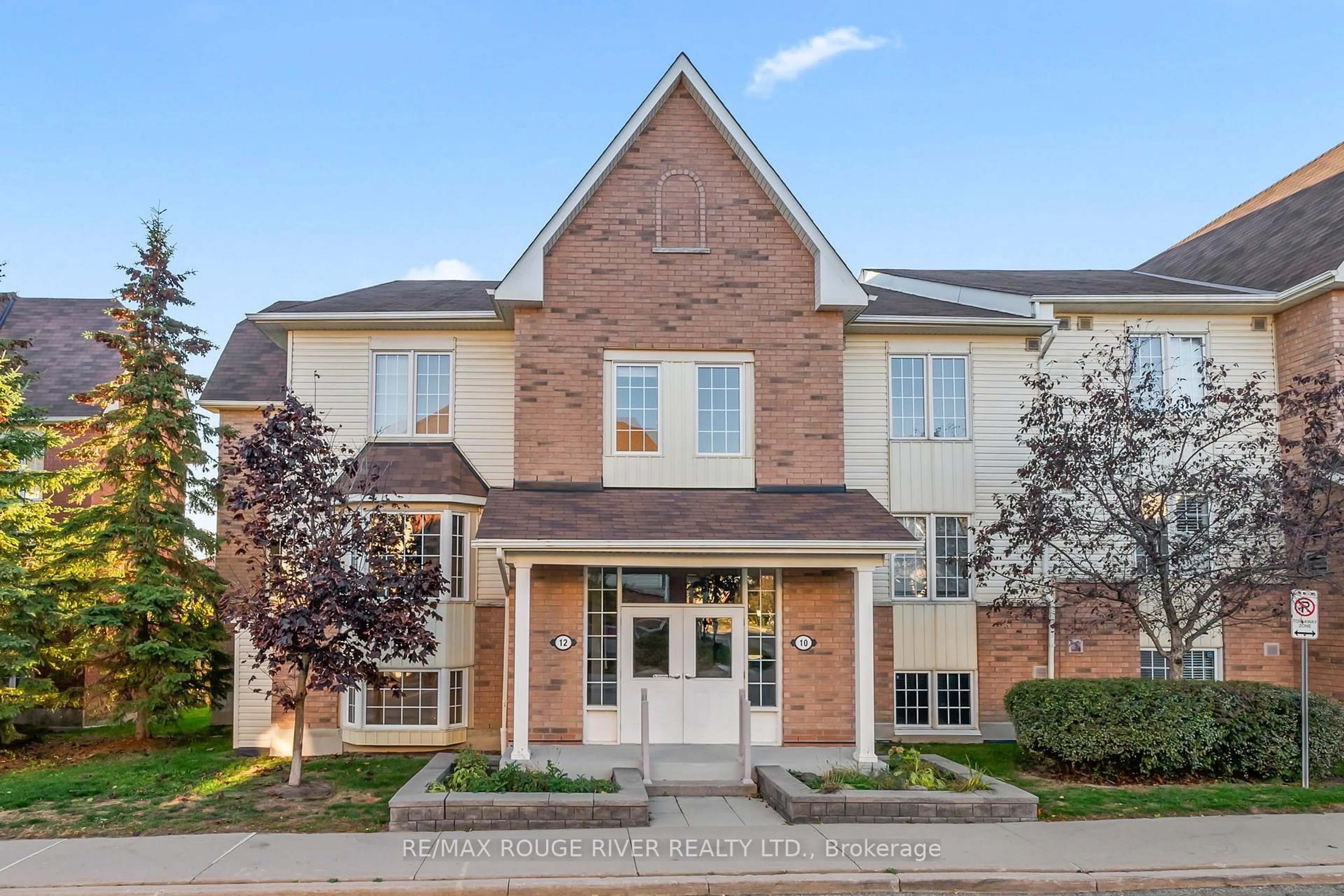 Home with brick exterior material, street for 12 Petra Way #1, Whitby Ontario L1R 0A6