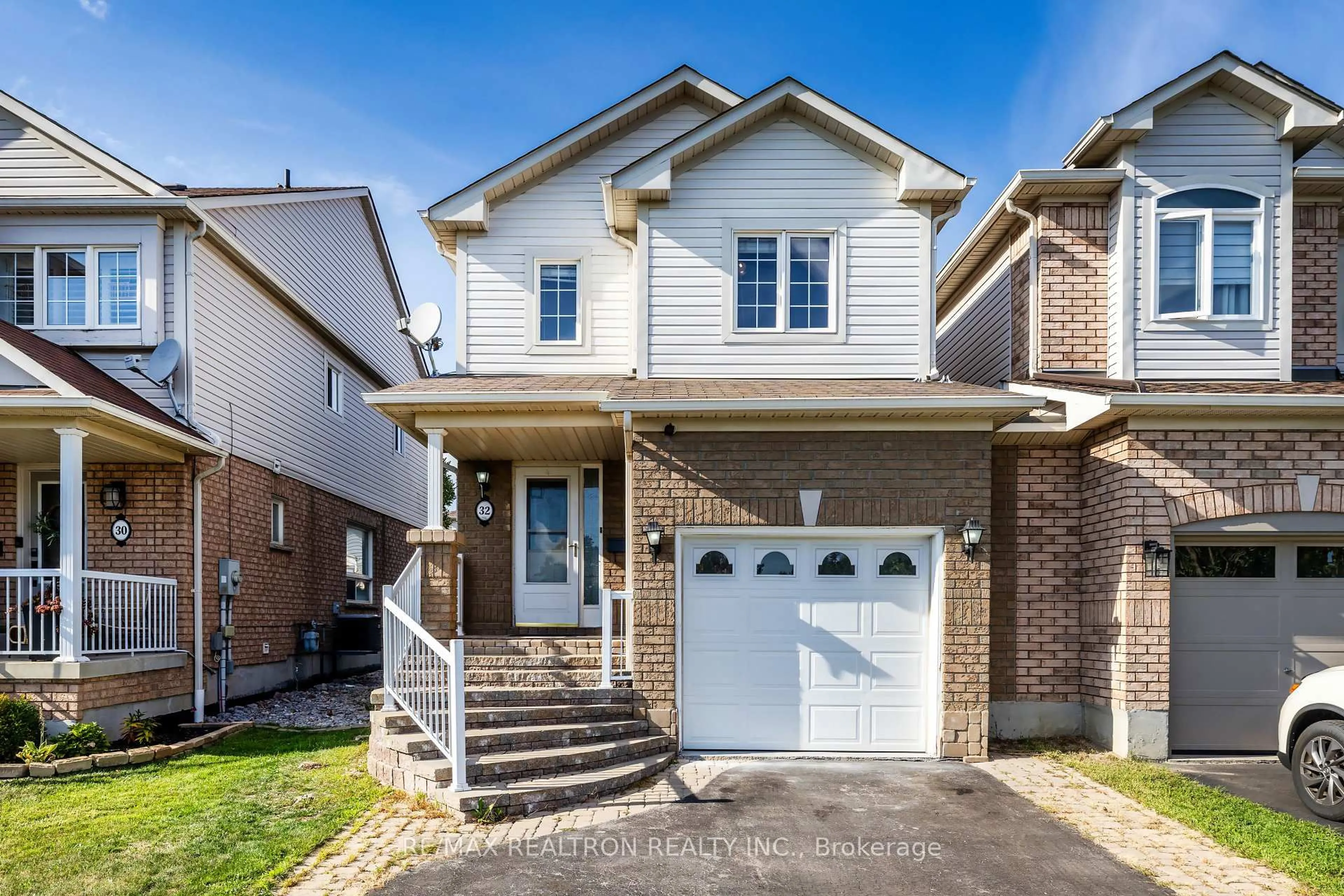 Home with brick exterior material, street for 32 Samandria Ave, Whitby Ontario L1R 2Z7