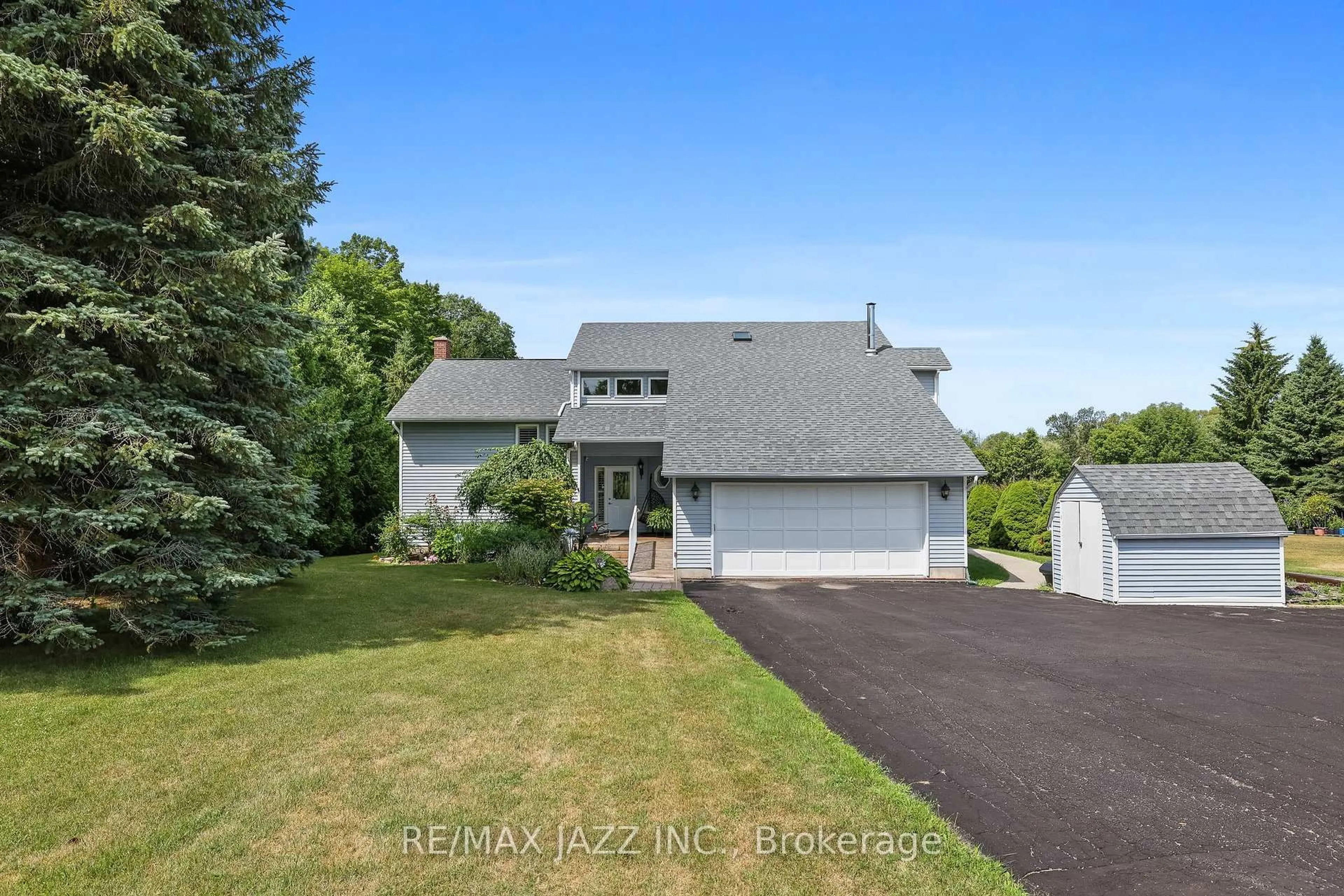 A pic from outside/outdoor area/front of a property/back of a property/a pic from drone, unknown for 4534 Trulls Rd, Clarington Ontario L0B 1J0