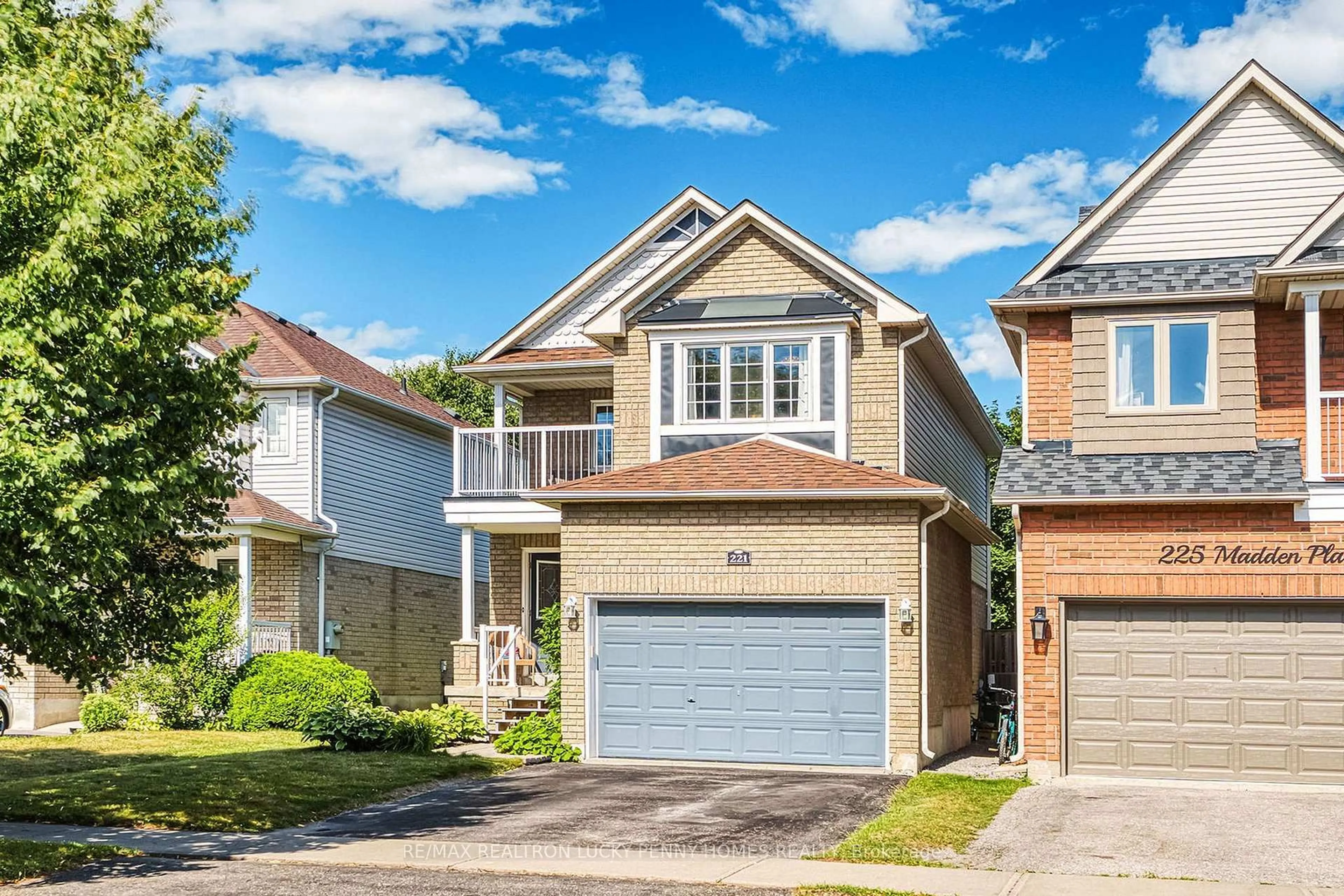 Home with vinyl exterior material, street for 221 Madden Pl, Clarington Ontario L1C 5H4