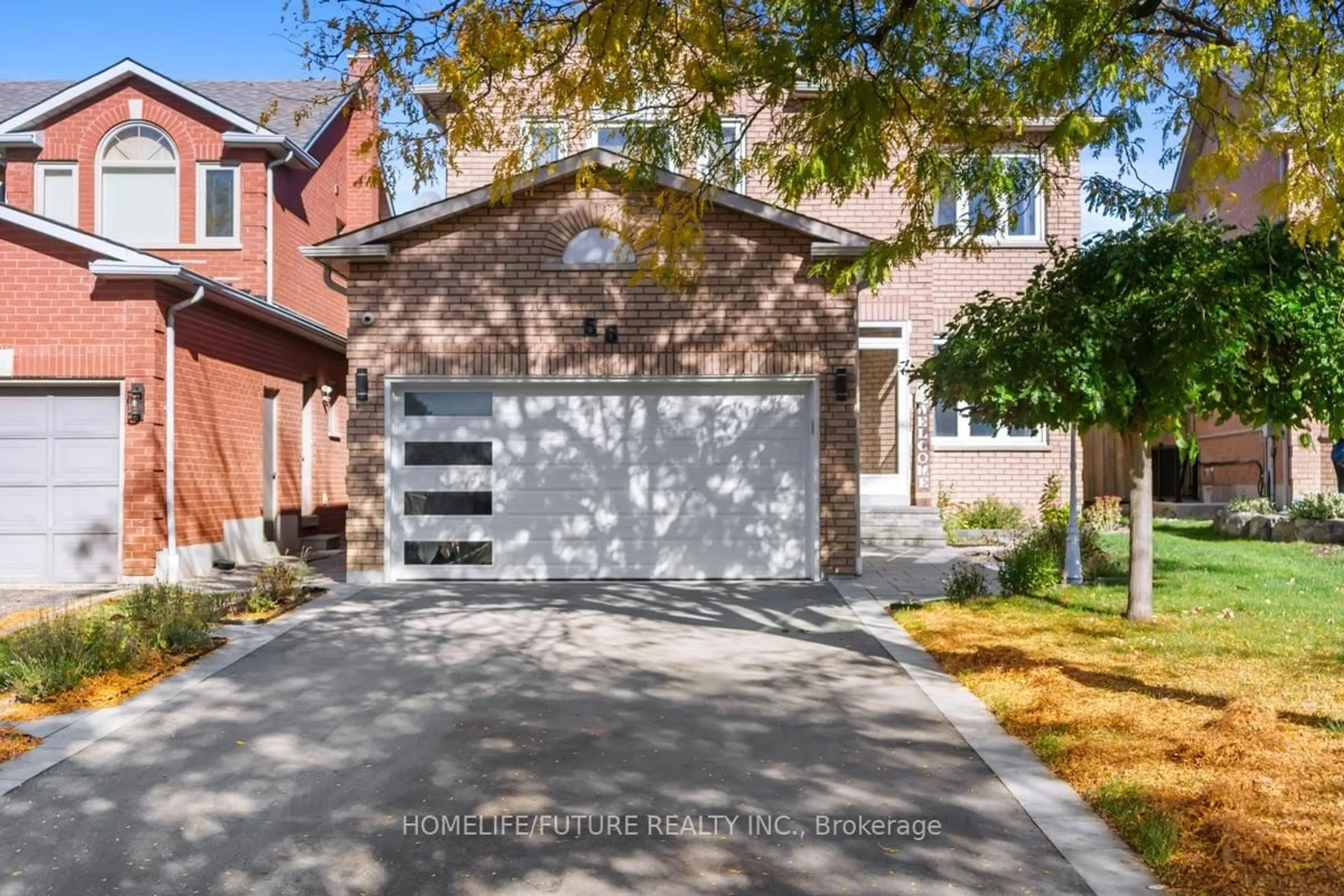 Home with brick exterior material, street for 56 Ringwood Dr, Whitby Ontario L1R 1Y7