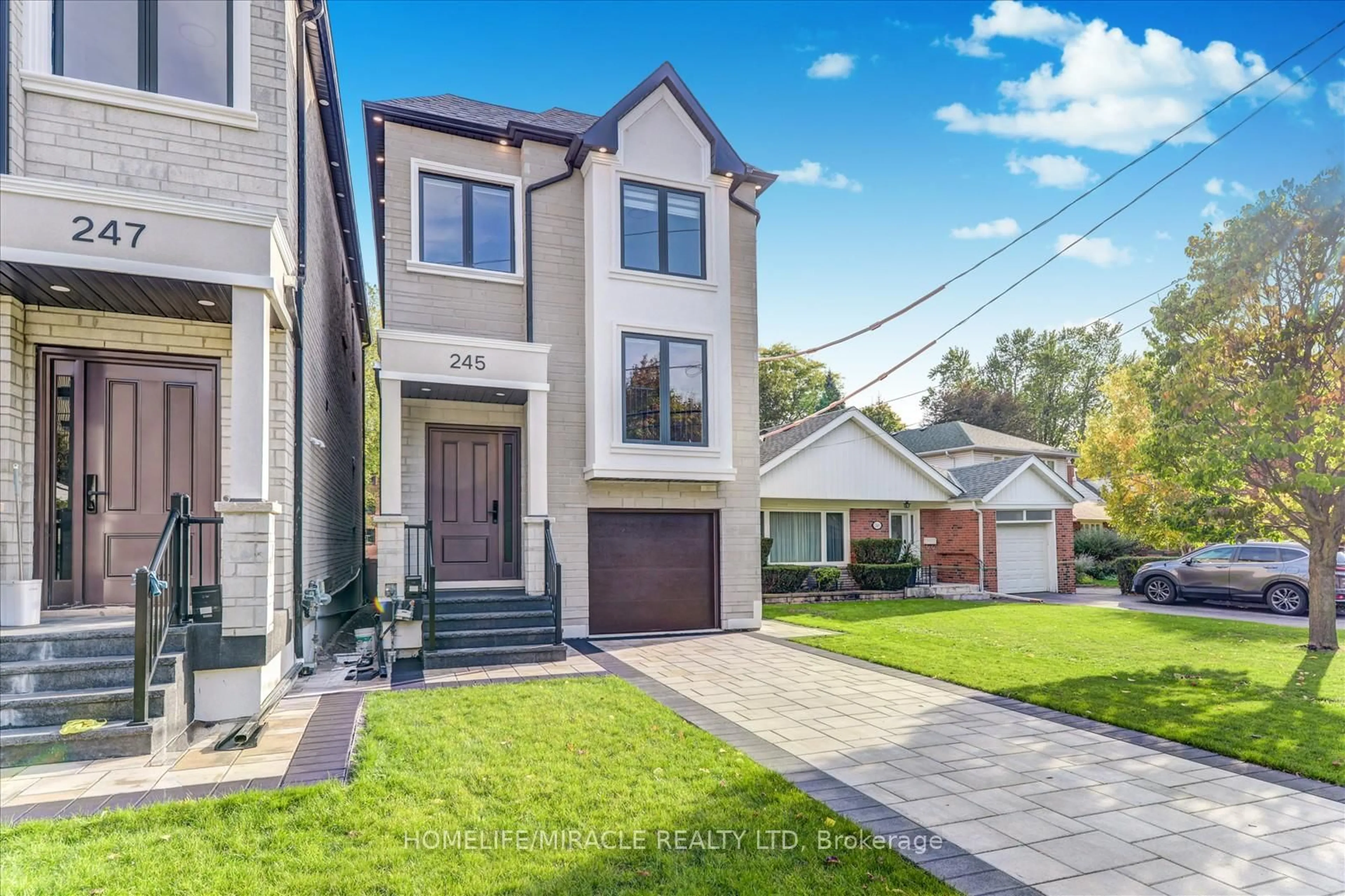 Home with brick exterior material, street for 245 Ferris Rd, Toronto Ontario M4B 1H2