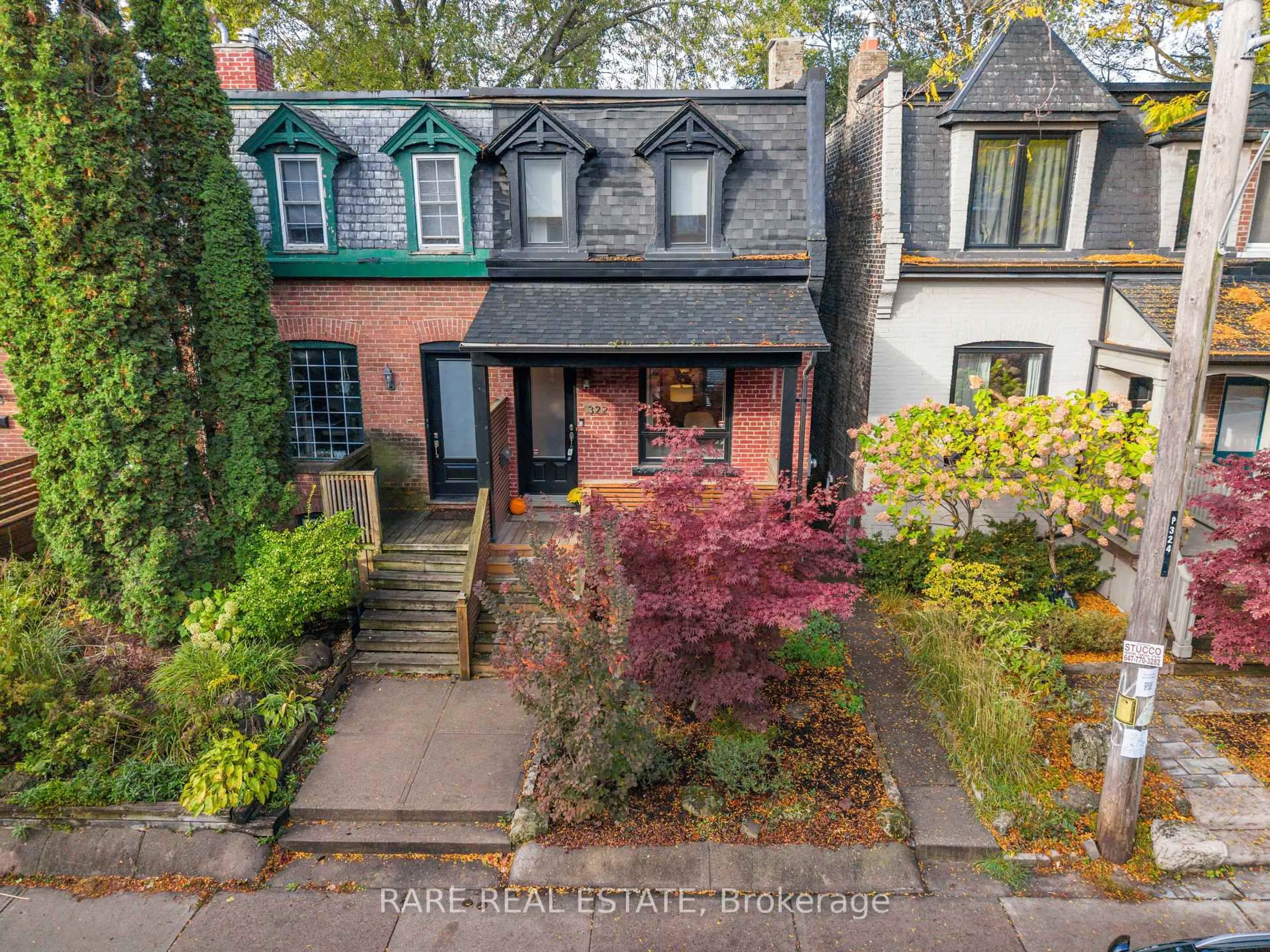 A pic from outside/outdoor area/front of a property/back of a property/a pic from drone, street for 322 Logan Ave, Toronto Ontario M4M 2N7