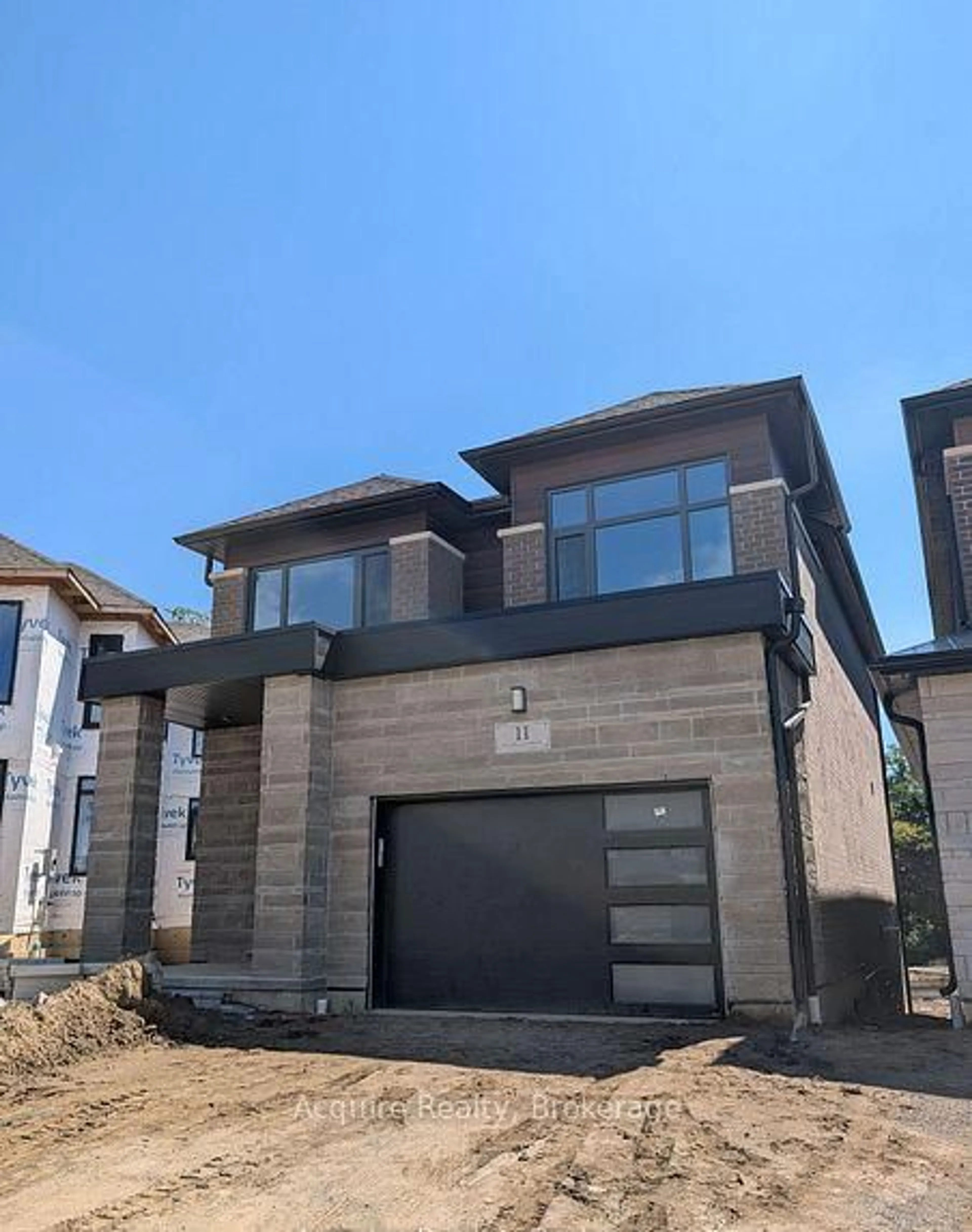 Home with brick exterior material, street for 11 Dagenham Dr Dr, Whitby Ontario L1P 0E2