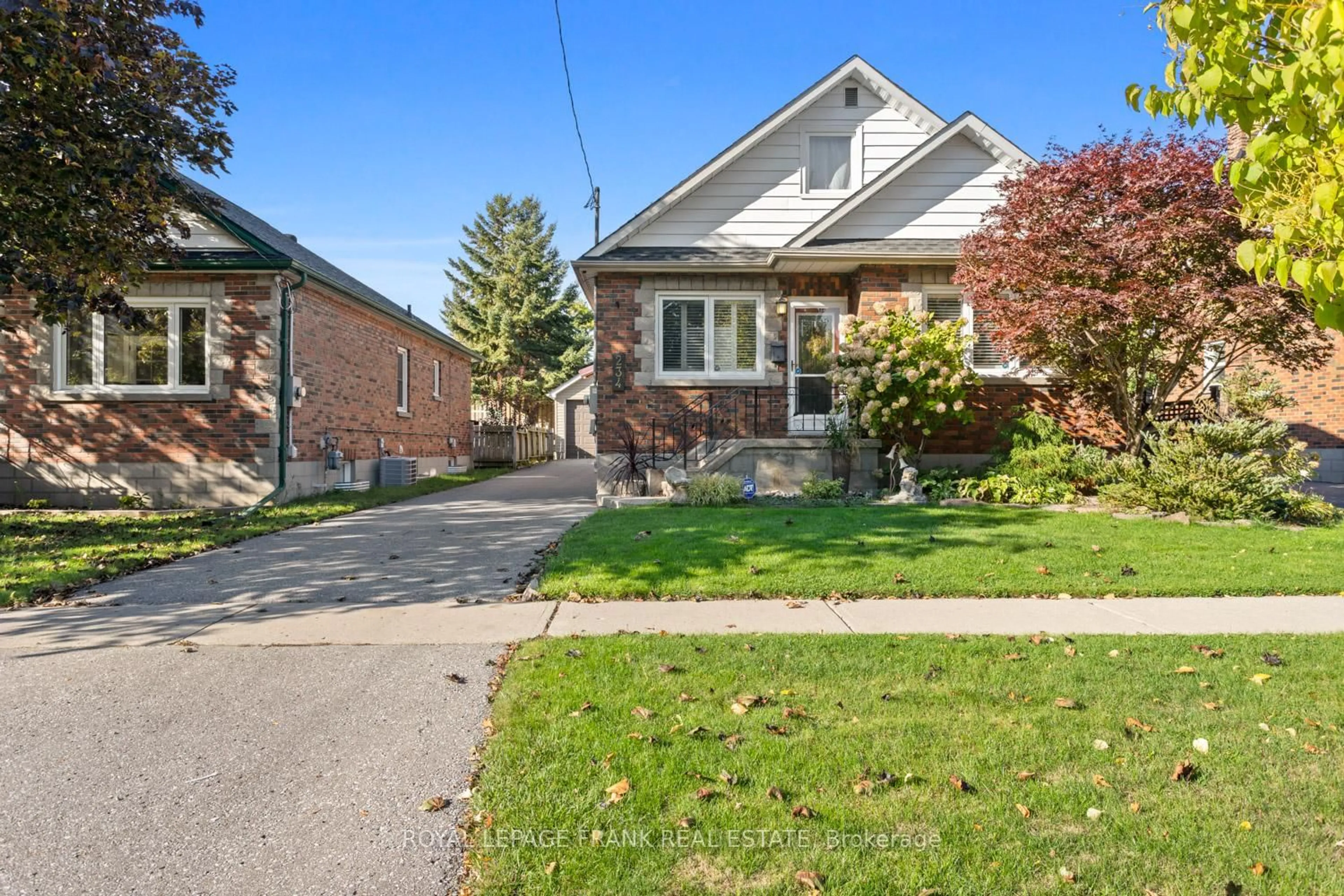 Home with brick exterior material, street for 234 Central Park Blvd, Oshawa Ontario L1H 5W8