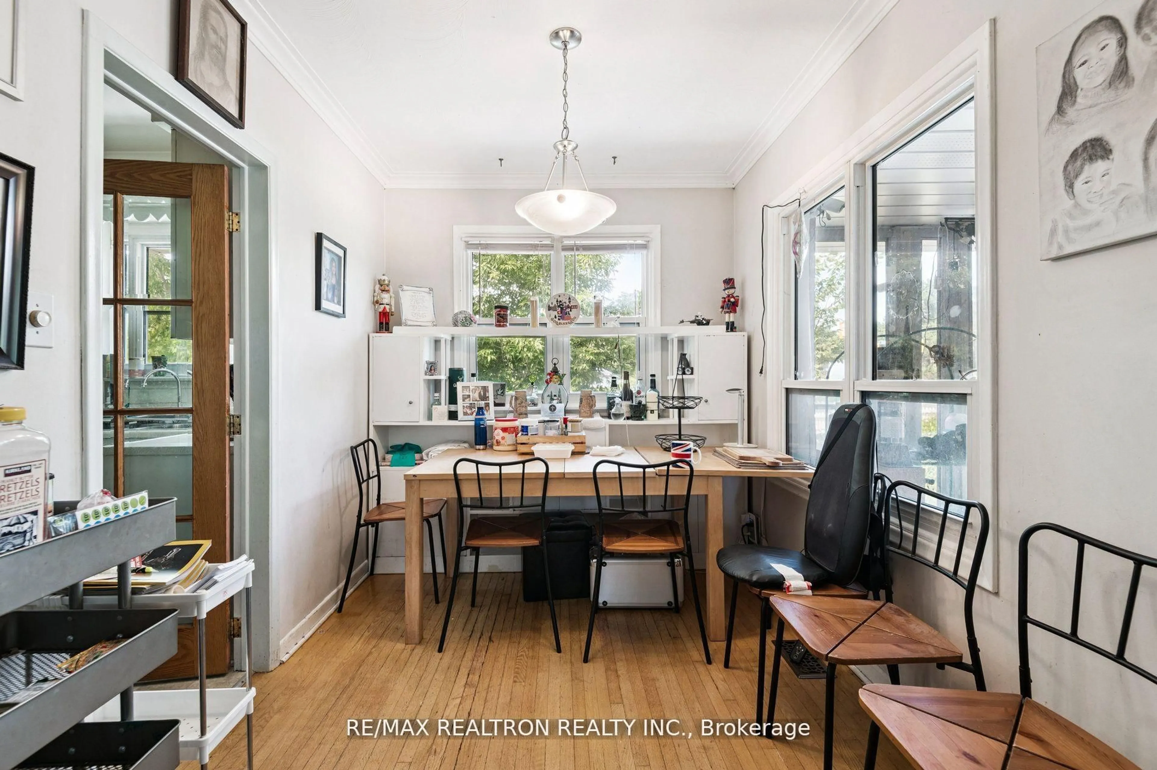 Dining room, wood/laminate floor for 4423 Lawrence Ave, Toronto Ontario M1E 2T6