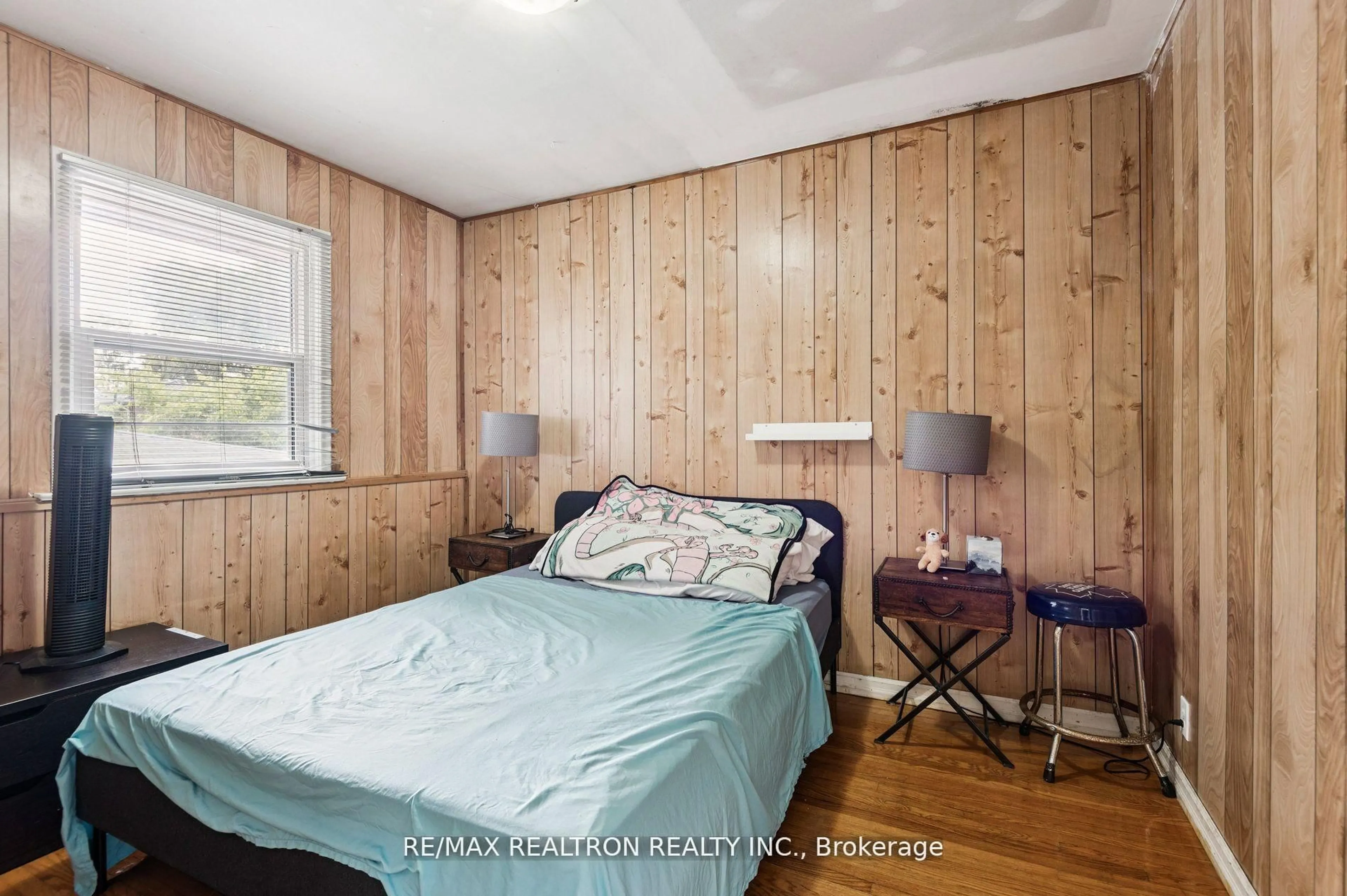 Bedroom with bed, wood/laminate floor for 4423 Lawrence Ave, Toronto Ontario M1E 2T6