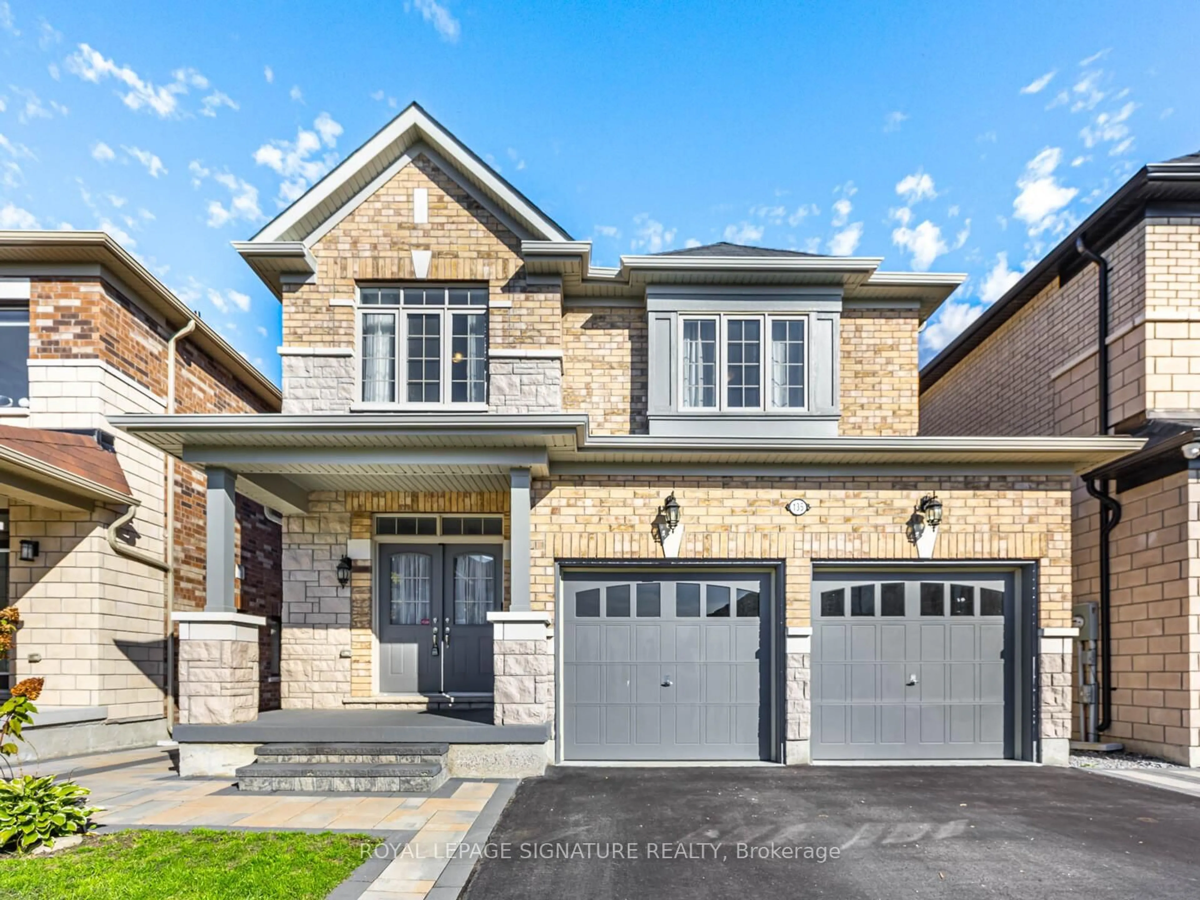 Home with brick exterior material, street for 135 Woolacott Lane, Clarington Ontario L1C 0J4