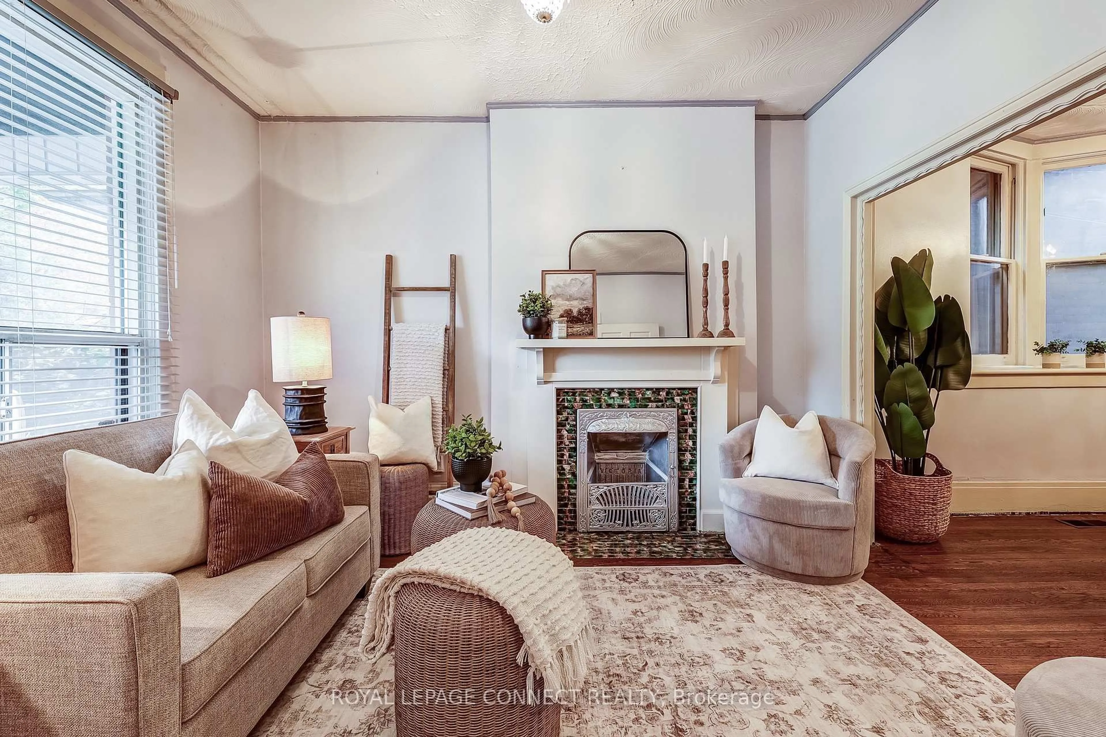 Living room with furniture, carpet floor for 38 Woodycrest Ave, Toronto Ontario M4J 3A7