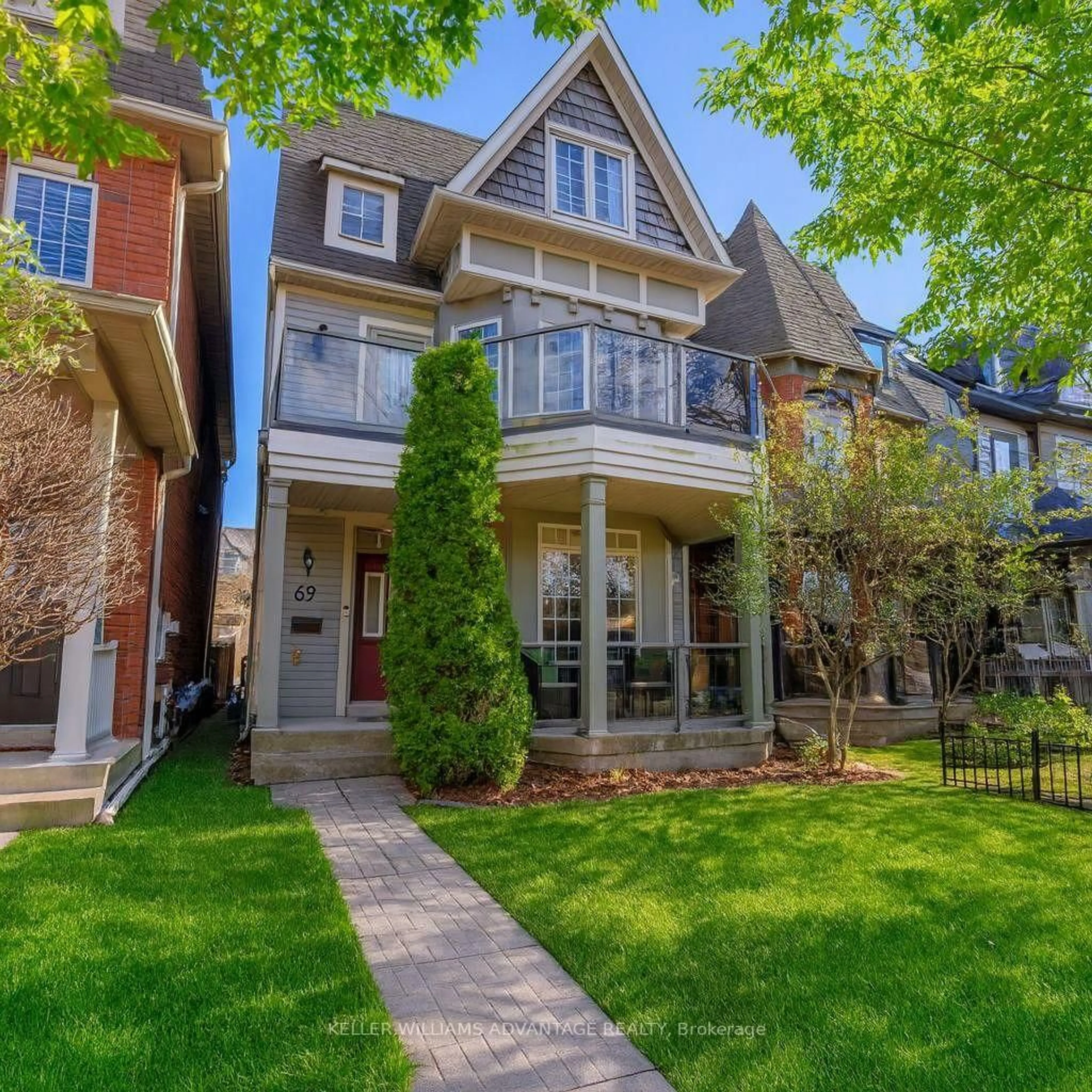 Home with brick exterior material, street for 69 Boardwalk Dr, Toronto Ontario M4L 3Z4