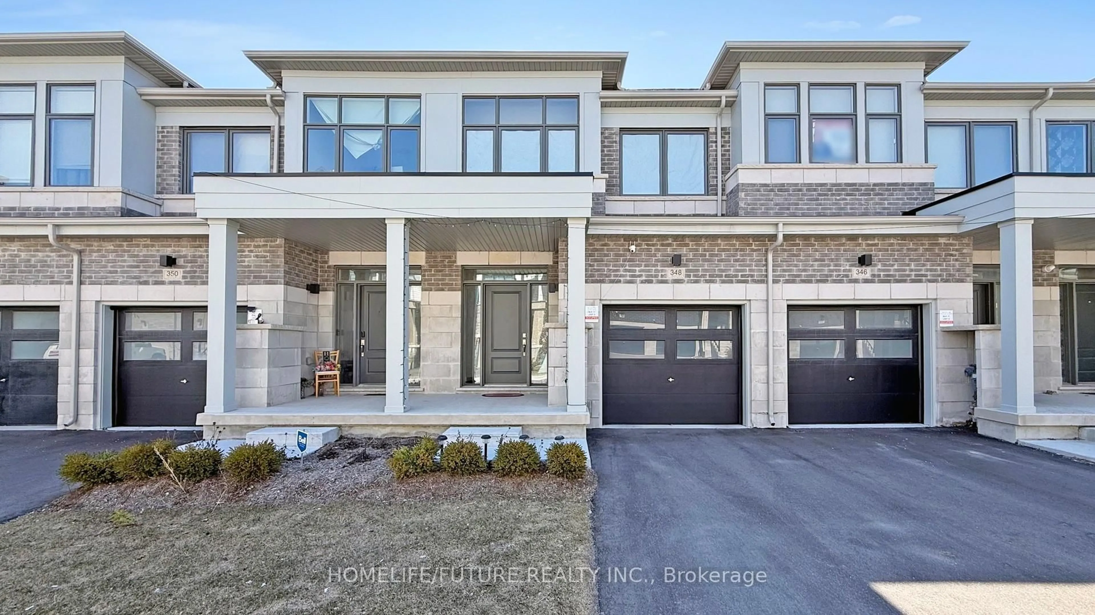 Home with brick exterior material, street for 348 Okanagan Path, Oshawa Ontario L1H 0A7