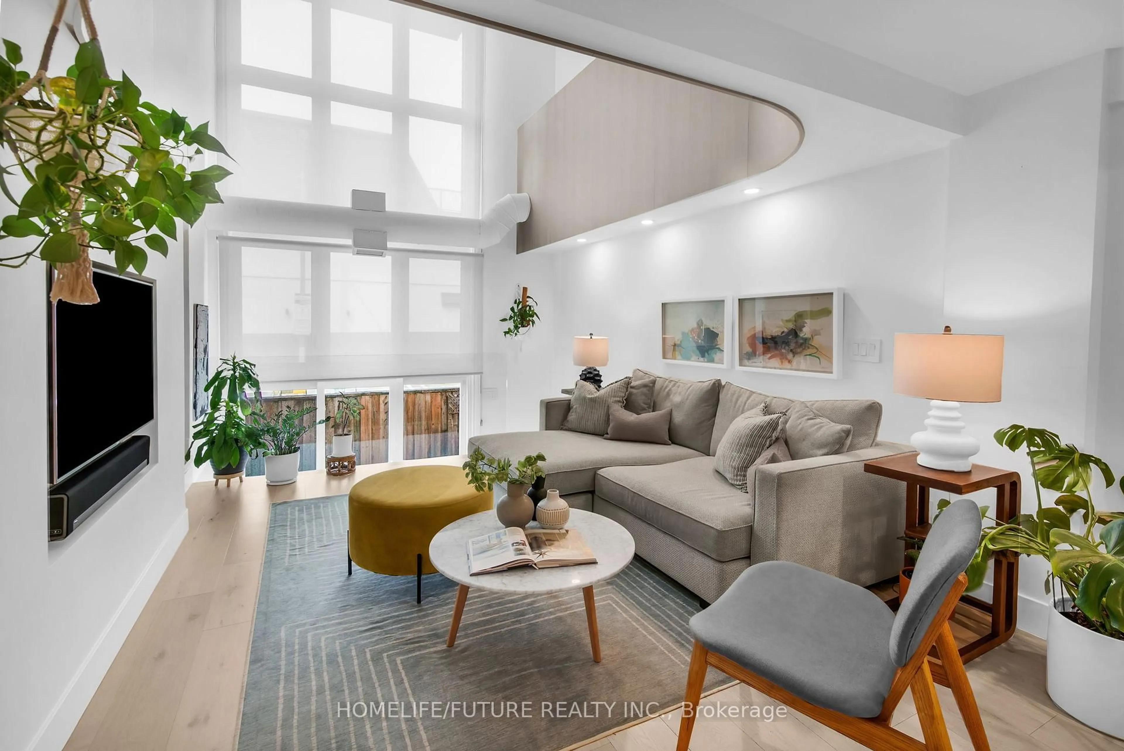 Living room with furniture, unknown for 660 Pape Ave #102, Toronto Ontario M4K 3S5