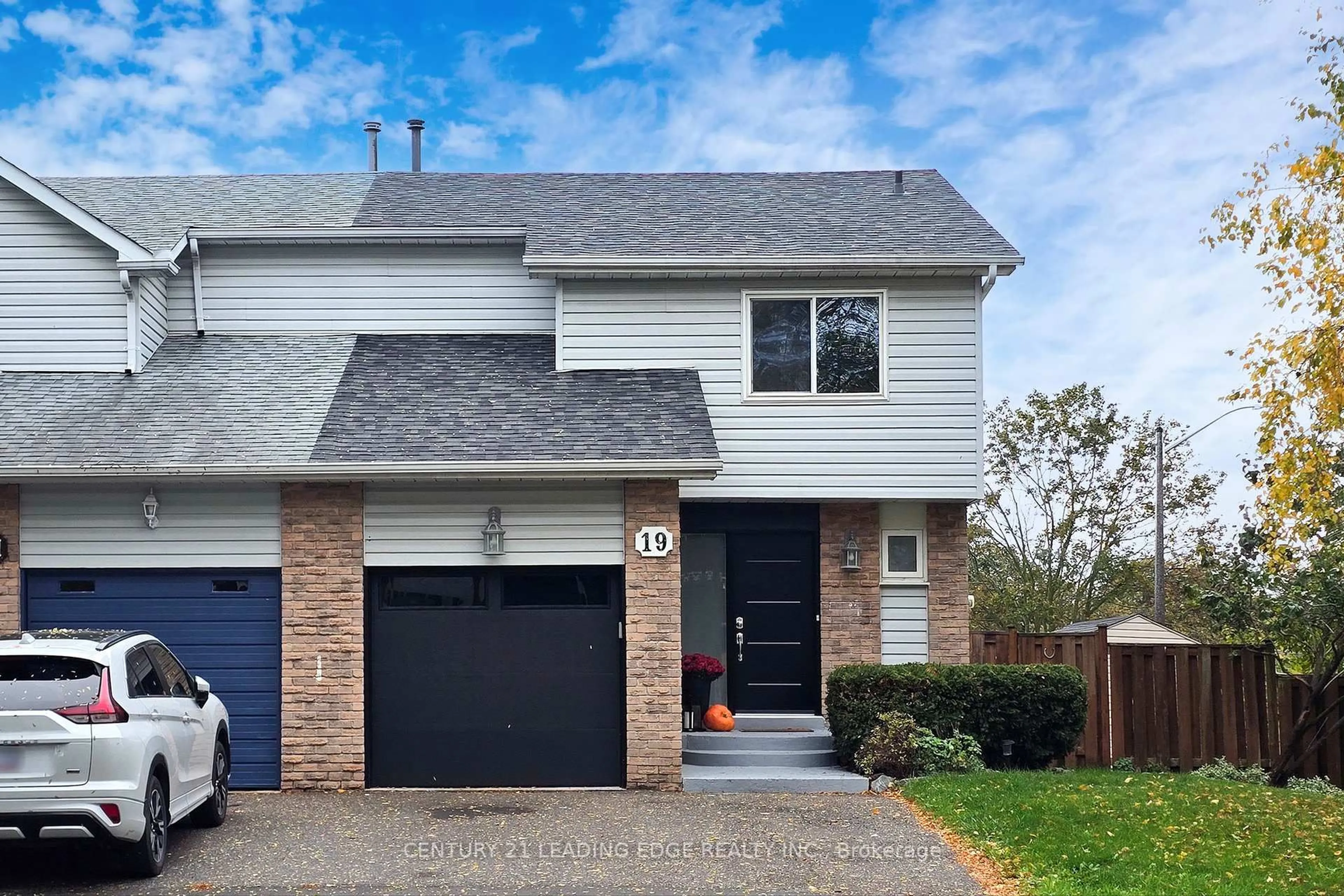 Home with vinyl exterior material, street for 19 Goodfellow St, Whitby Ontario L1P 1C3