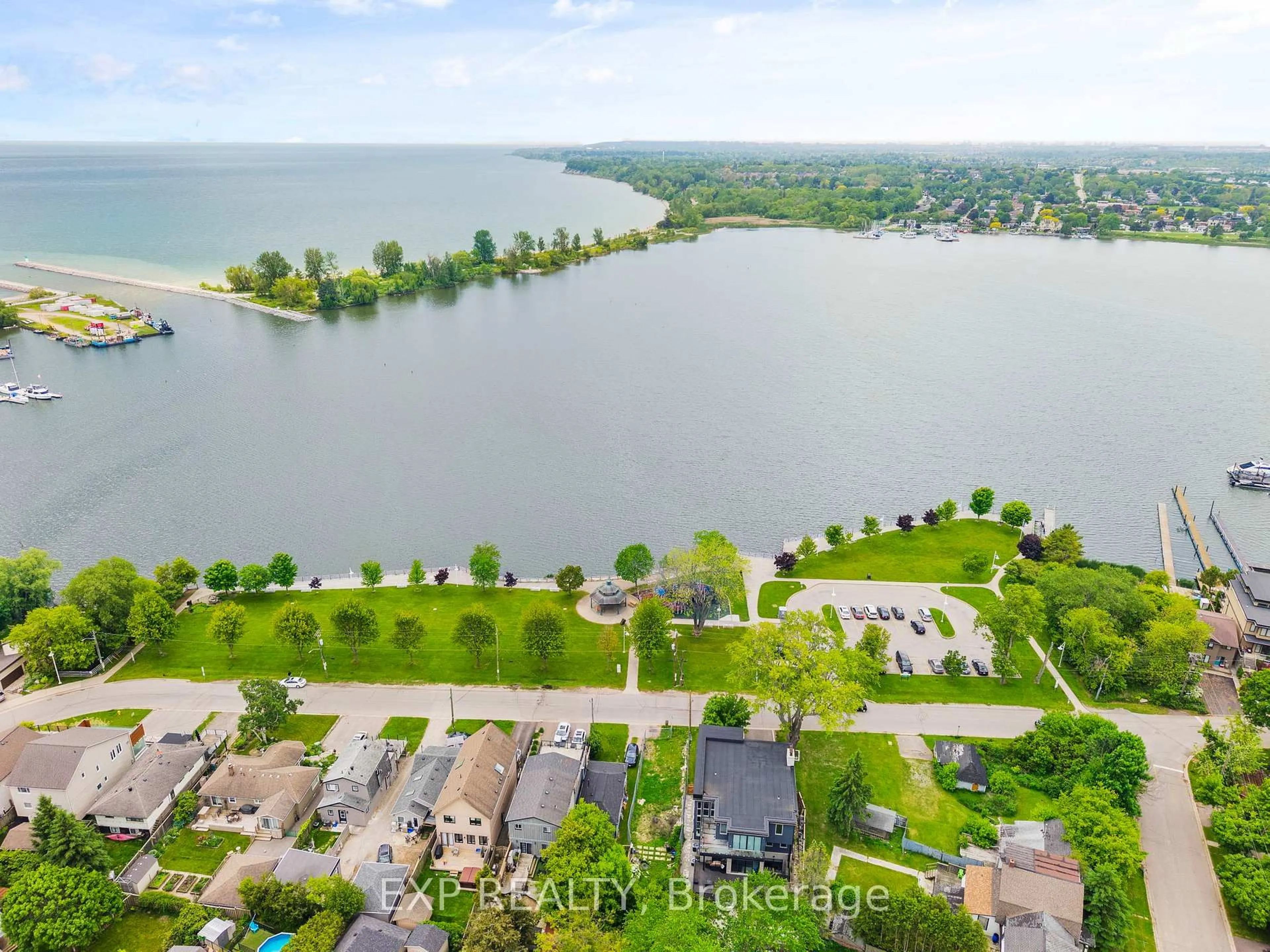 A pic from outside/outdoor area/front of a property/back of a property/a pic from drone, water/lake/river/ocean view for 1295 Wharf St ##30, Pickering Ontario L1W 1A2