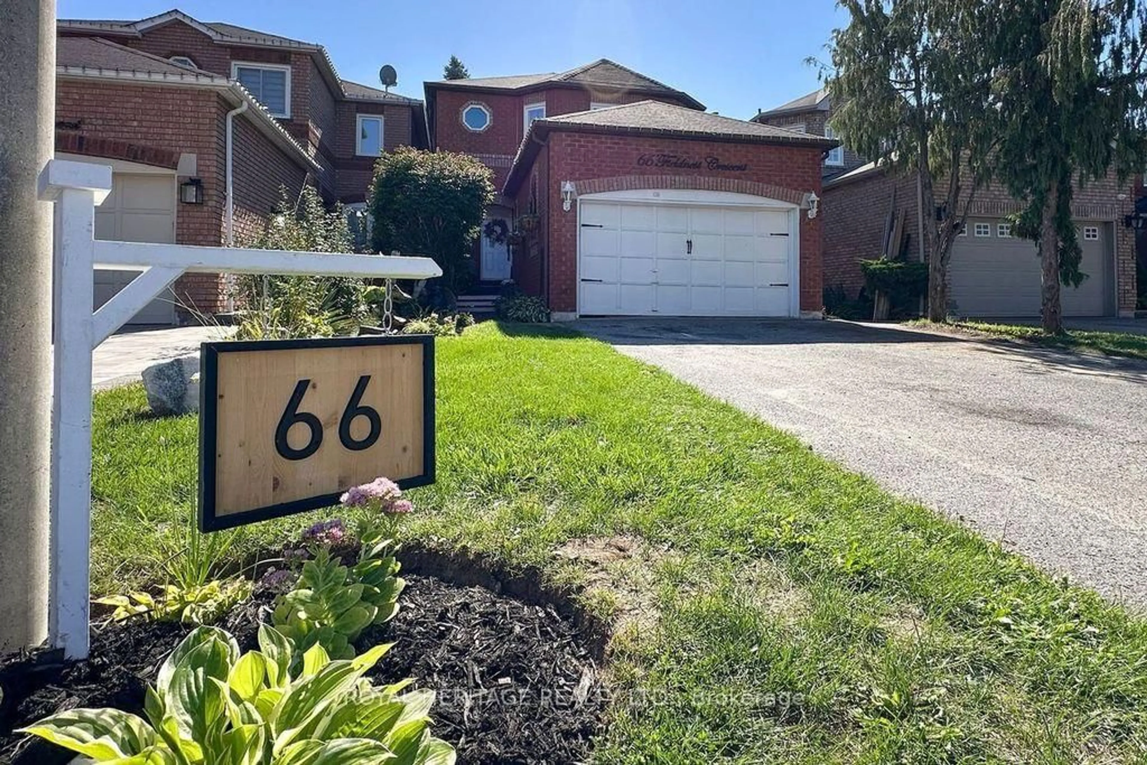 Home with brick exterior material, street for 66 Fieldnest Cres, Whitby Ontario L1R 1Z6