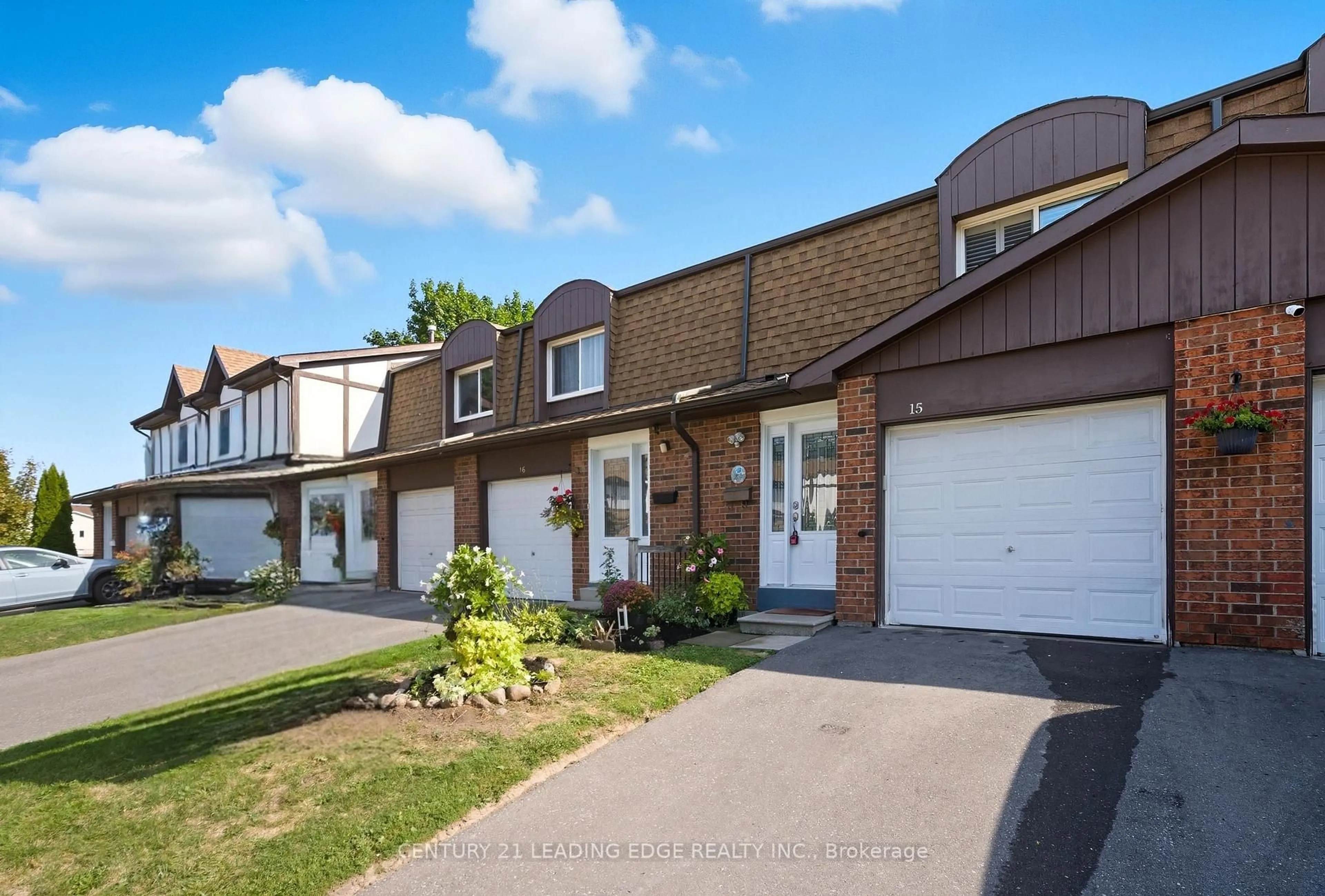 A pic from outside/outdoor area/front of a property/back of a property/a pic from drone, street for 1980 Rosefield Rd #15, Pickering Ontario L1V 3M4