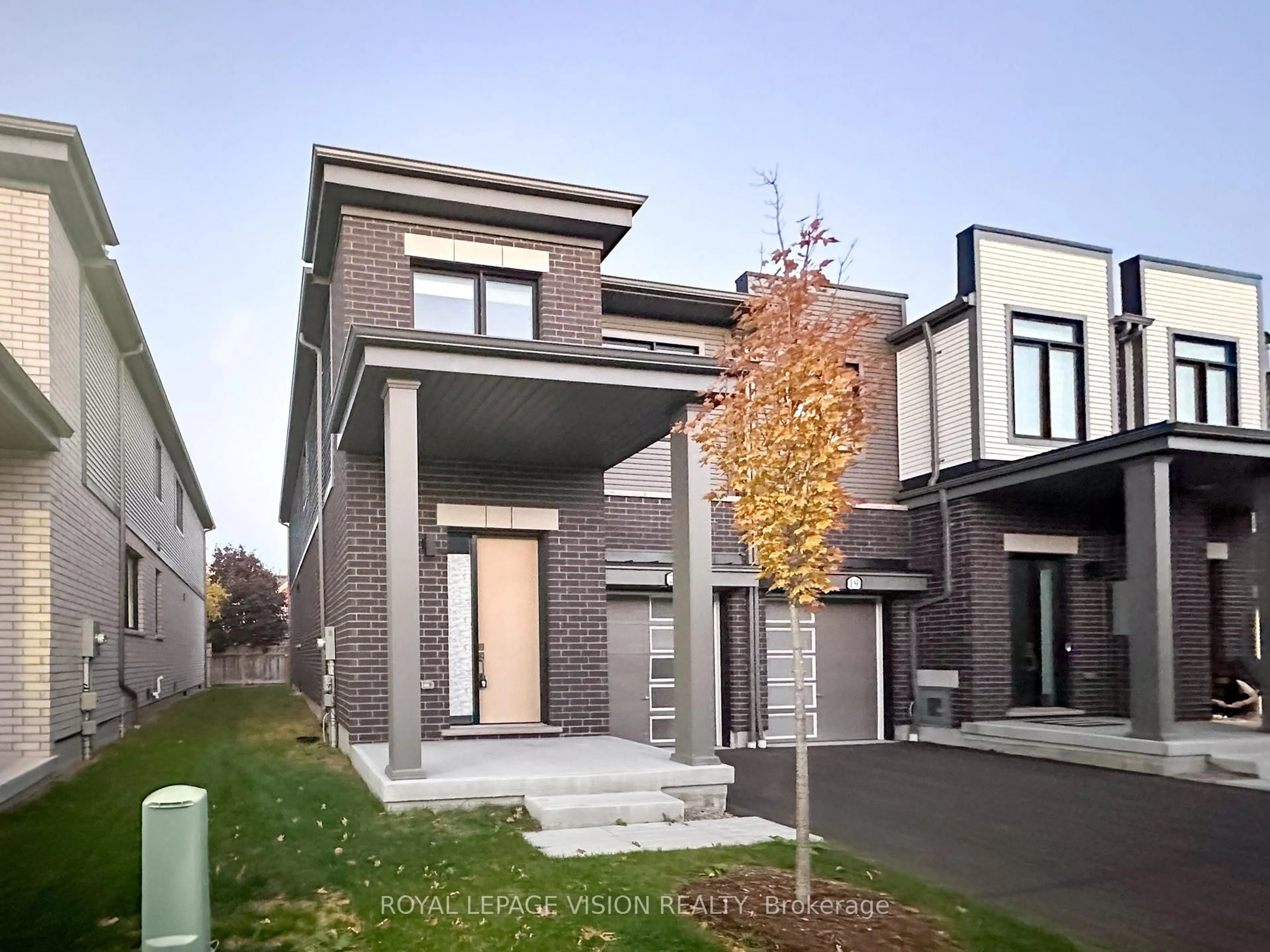 Home with brick exterior material, street for 21 Sorbara Way, Whitby Ontario L1M 0M4