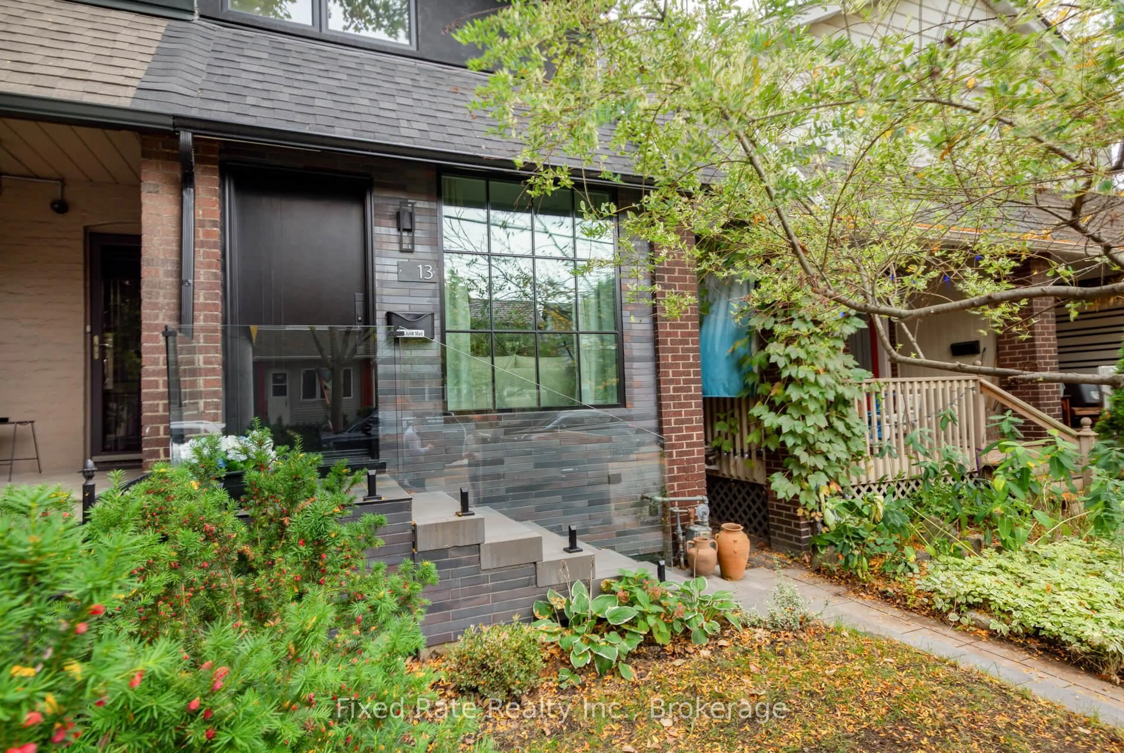 Home with brick exterior material, street for 13 Larchmount Ave, Toronto Ontario M4M 2Y6
