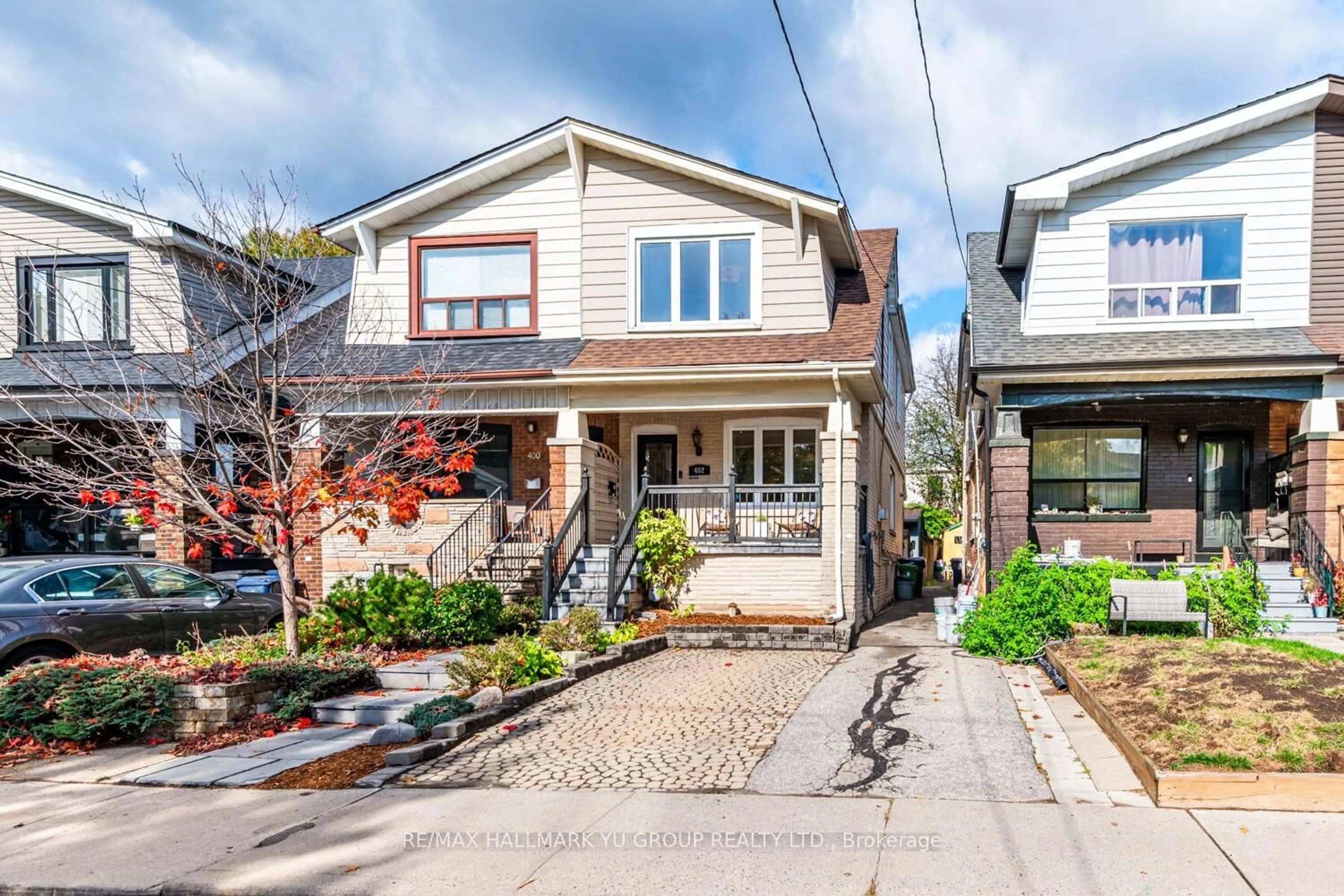 Home with brick exterior material, street for 402 Milverton Blvd, Toronto Ontario M4J 1V9