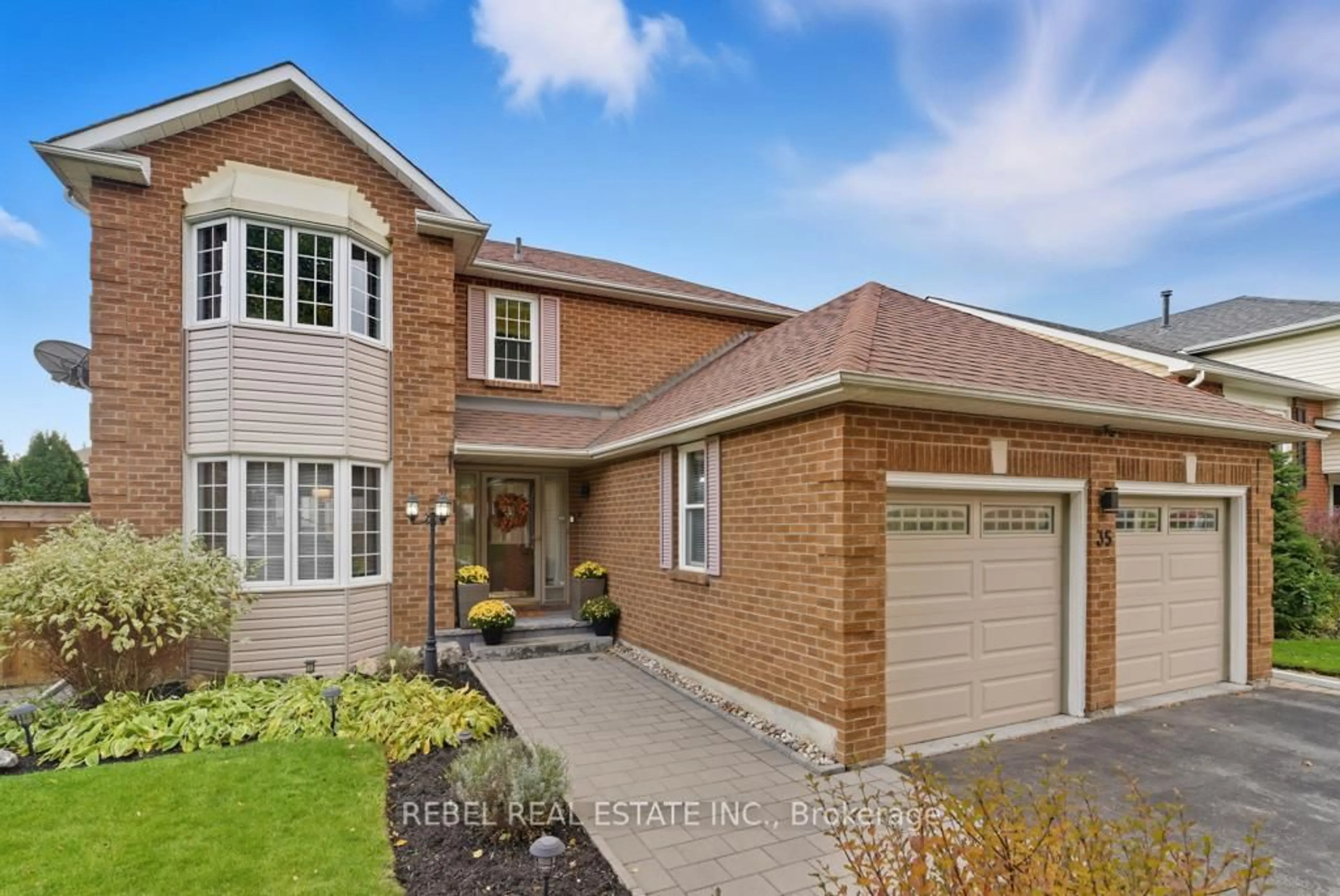 Home with brick exterior material, street for 35 Orchard Park Dr, Clarington Ontario L1C 4E3