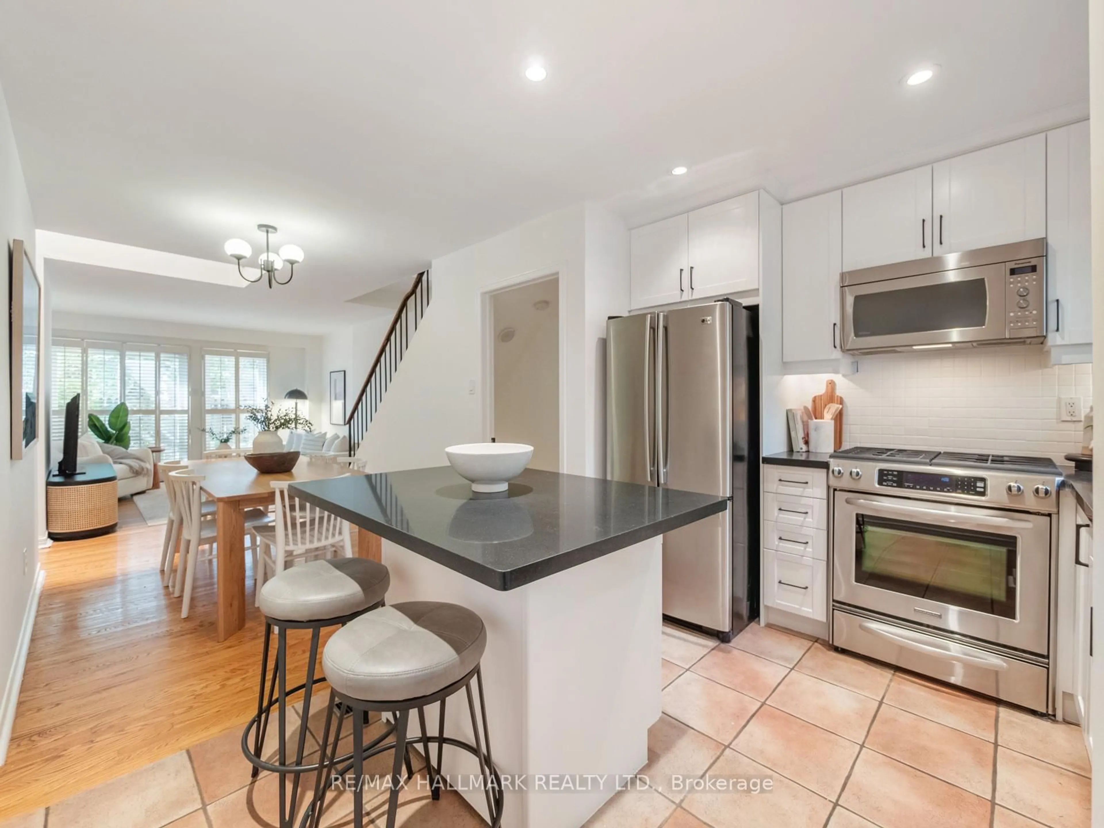 Open concept kitchen, ceramic/tile floor for 66 Boultbee Ave #2, Toronto Ontario M4J 1B1