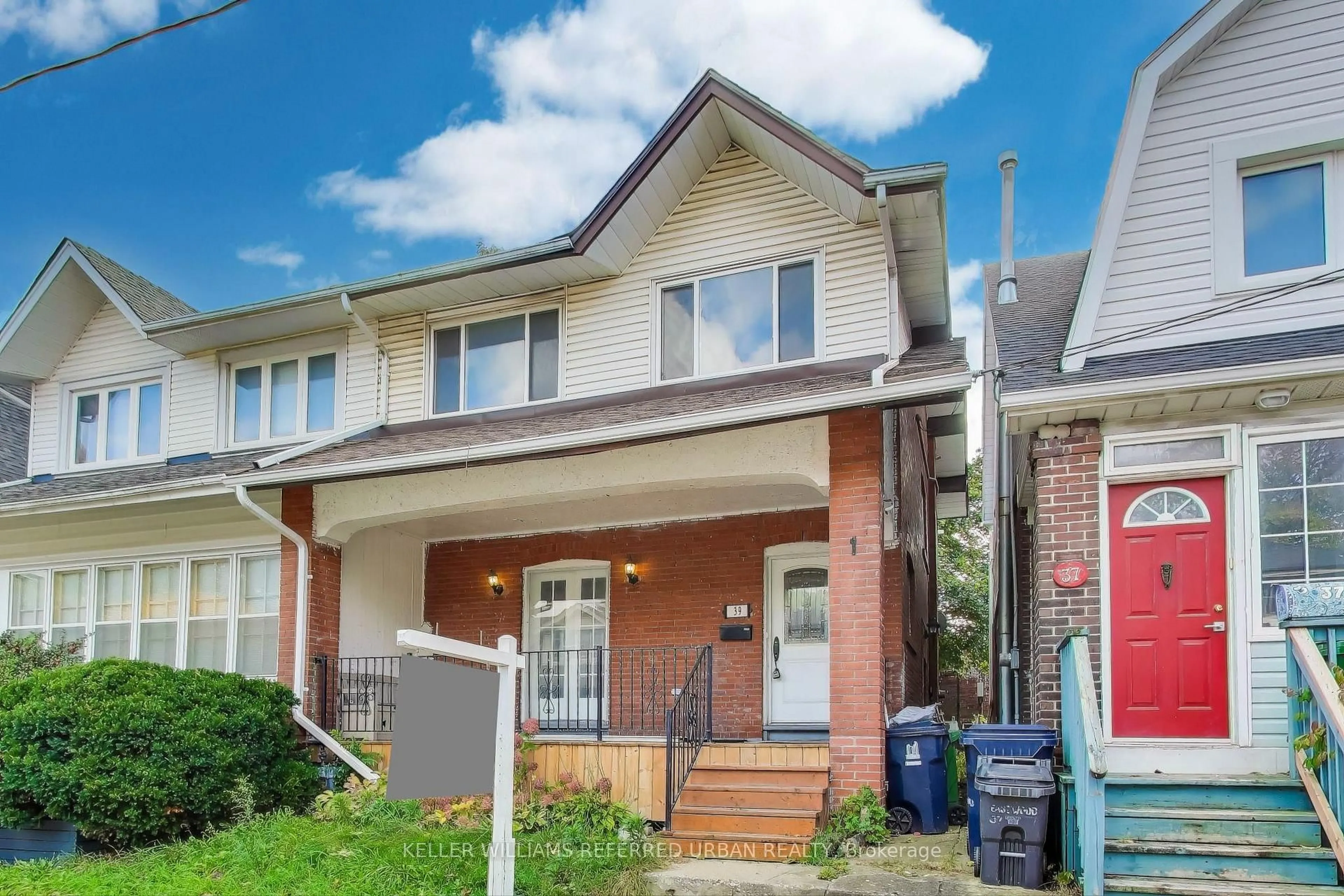 Home with brick exterior material, street for 39 Eastwood Rd, Toronto Ontario M4L 2C6