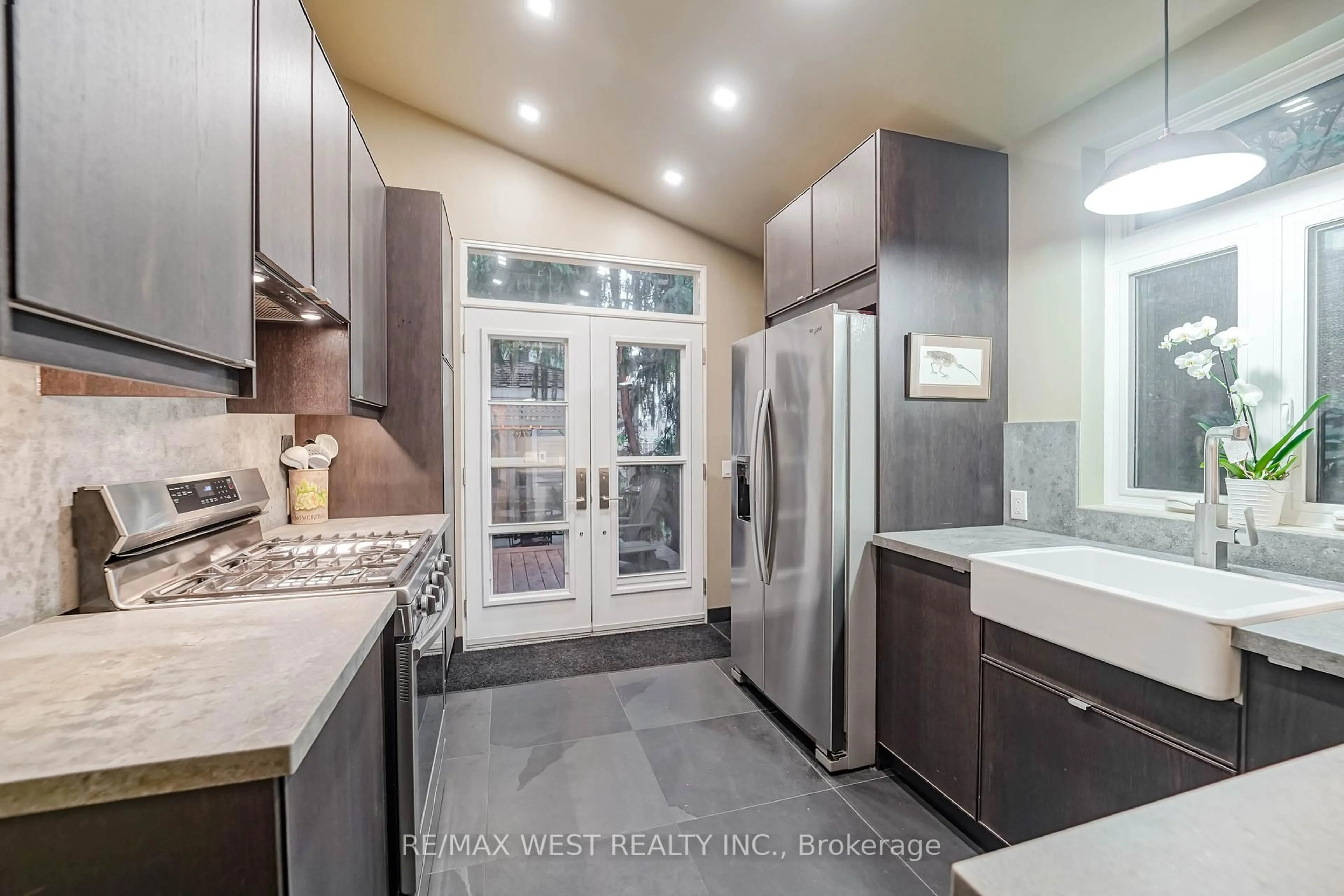 Contemporary kitchen, ceramic/tile floor for 153 Booth Ave, Toronto Ontario M4M 2M5