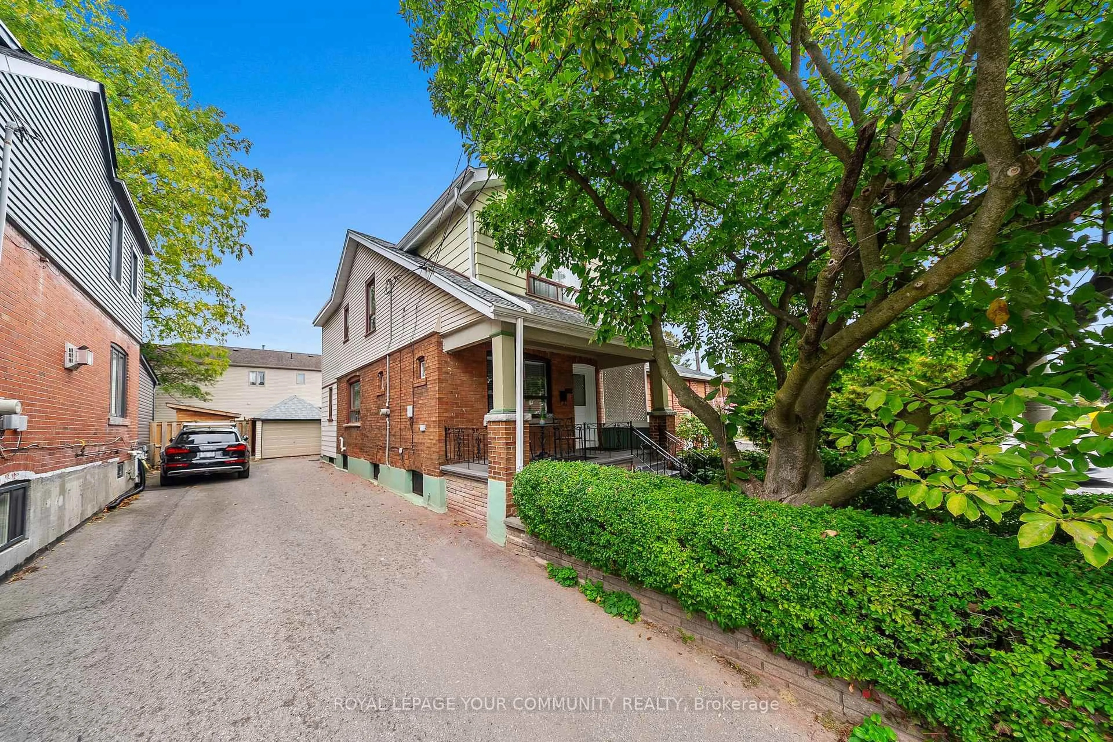 Home with brick exterior material, street for 246 Westlake Ave, Toronto Ontario M4C 4T2