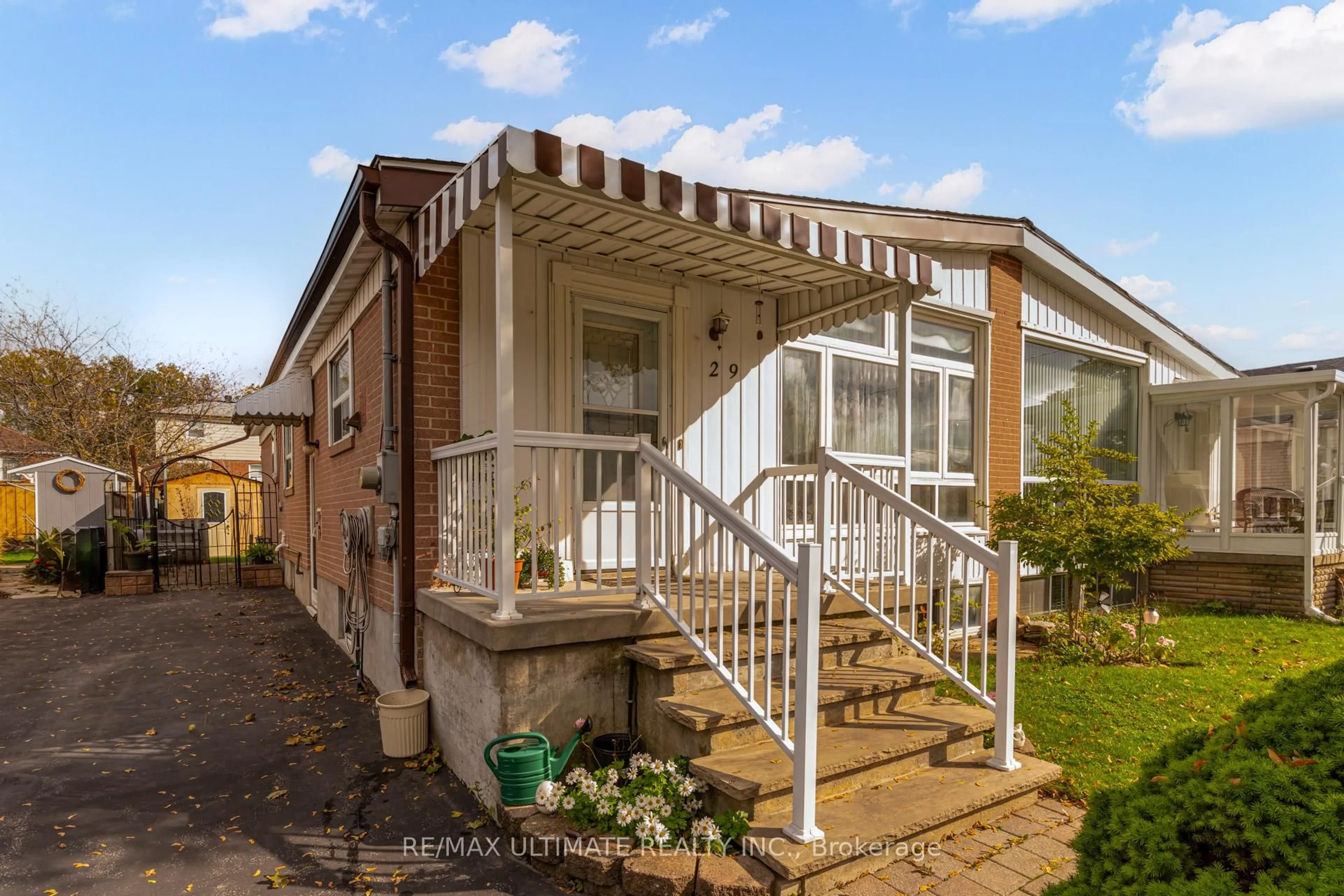 Home with vinyl exterior material, street for 29 Clapperton Ave, Toronto Ontario M1L 4K7