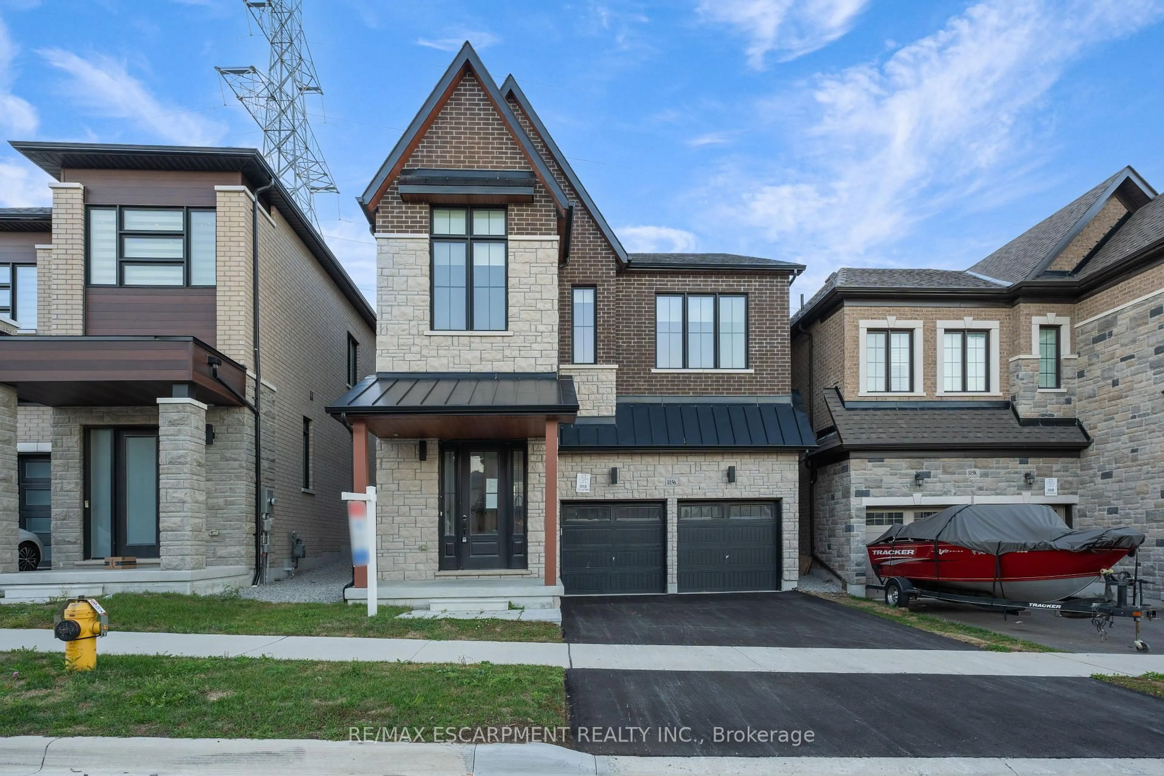 Home with brick exterior material, street for 1156 Skyridge Blvd, Pickering Ontario L1X 0M4