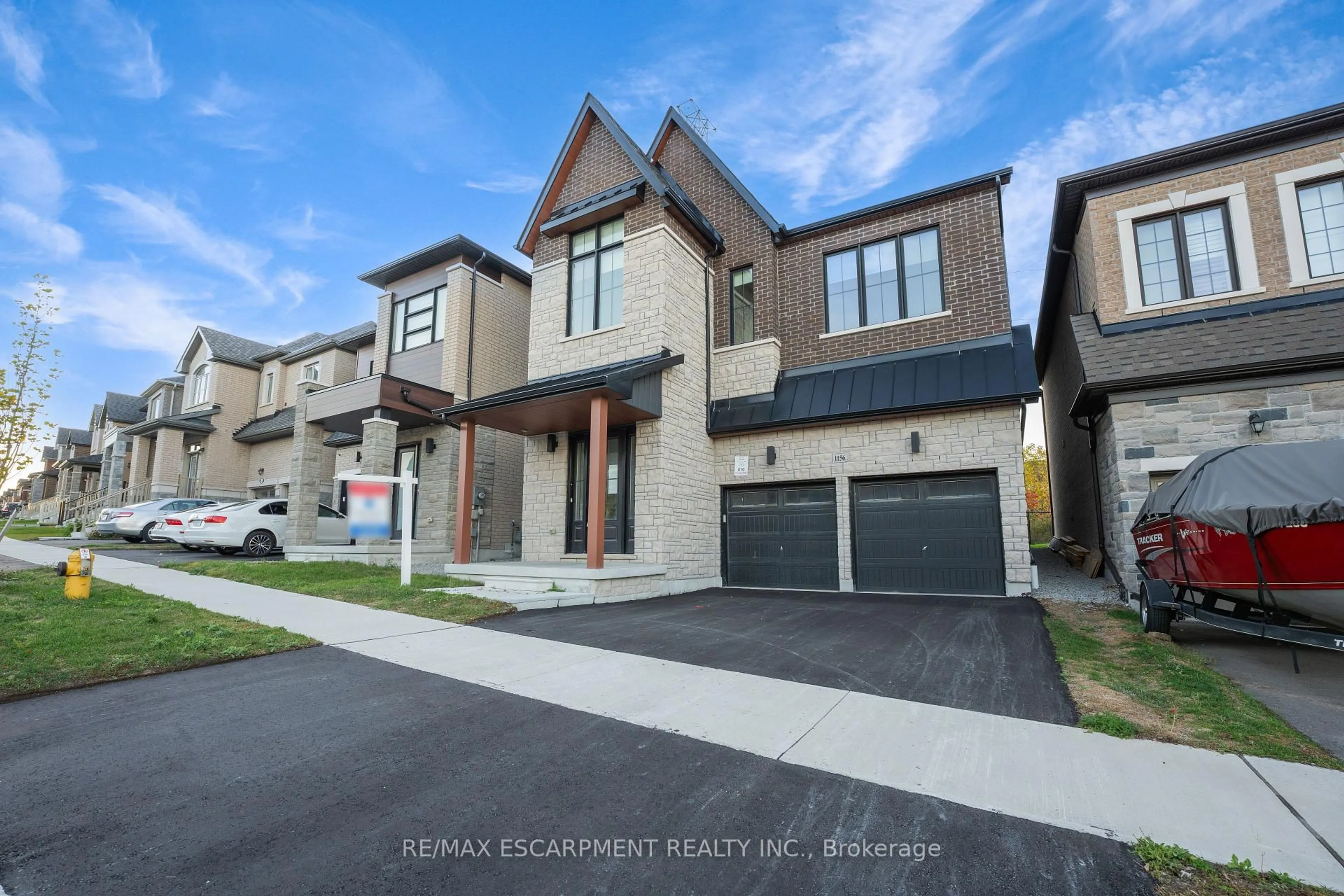 Home with brick exterior material, street for 1156 Skyridge Blvd, Pickering Ontario L1X 0M4