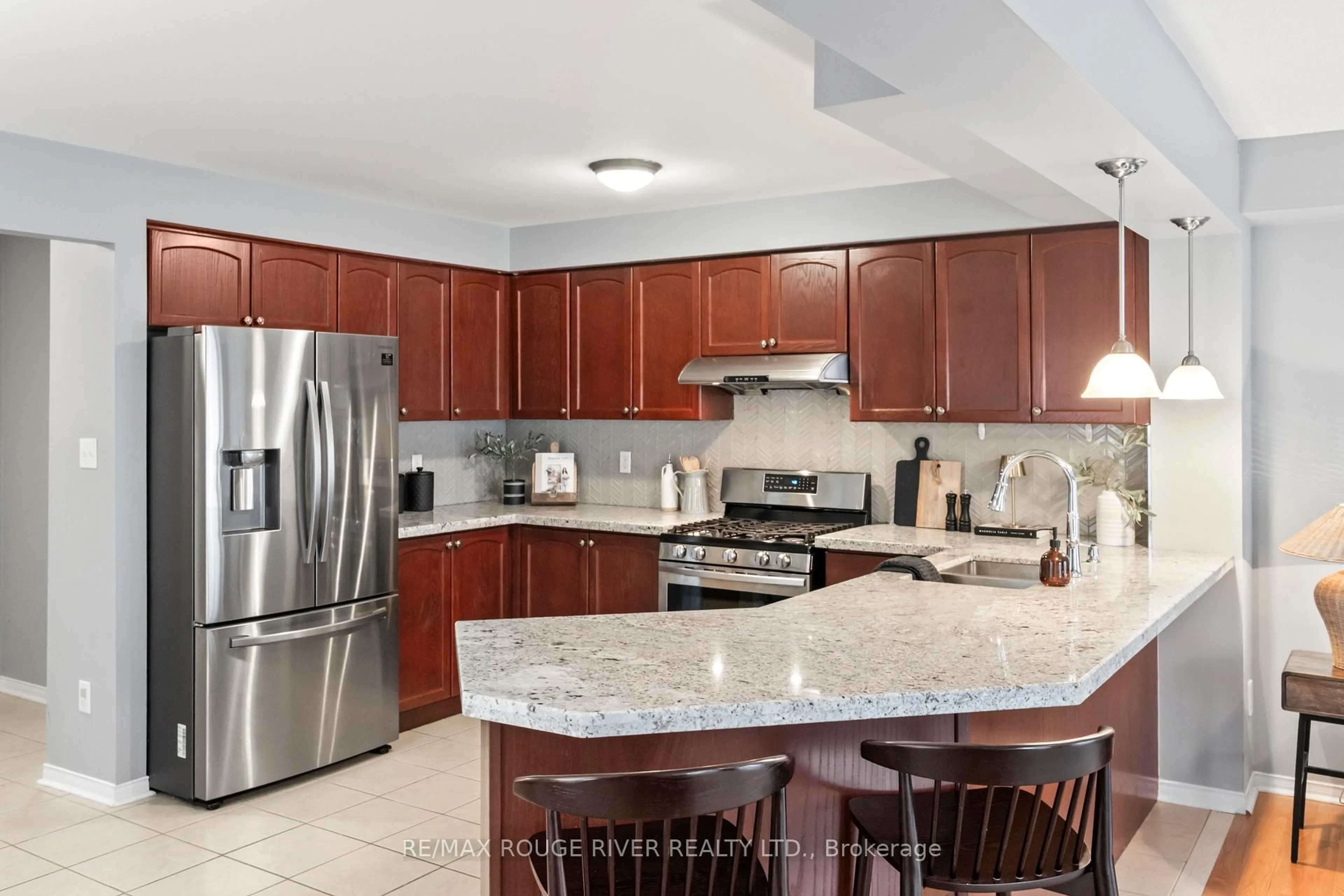Open concept kitchen, ceramic/tile floor for 32 Beer Cres, Ajax Ontario L1S 0A4