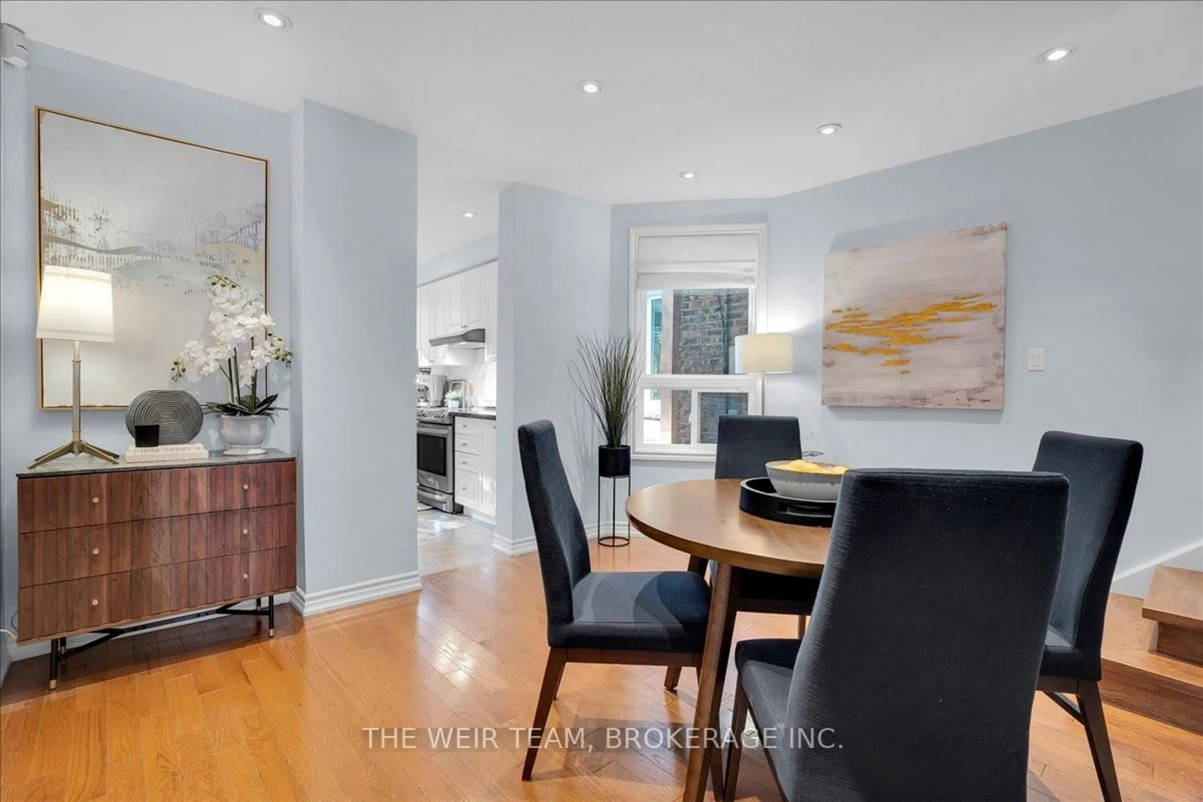 Dining room, wood/laminate floor for 107 Barker Ave, Toronto Ontario M4C 2N8