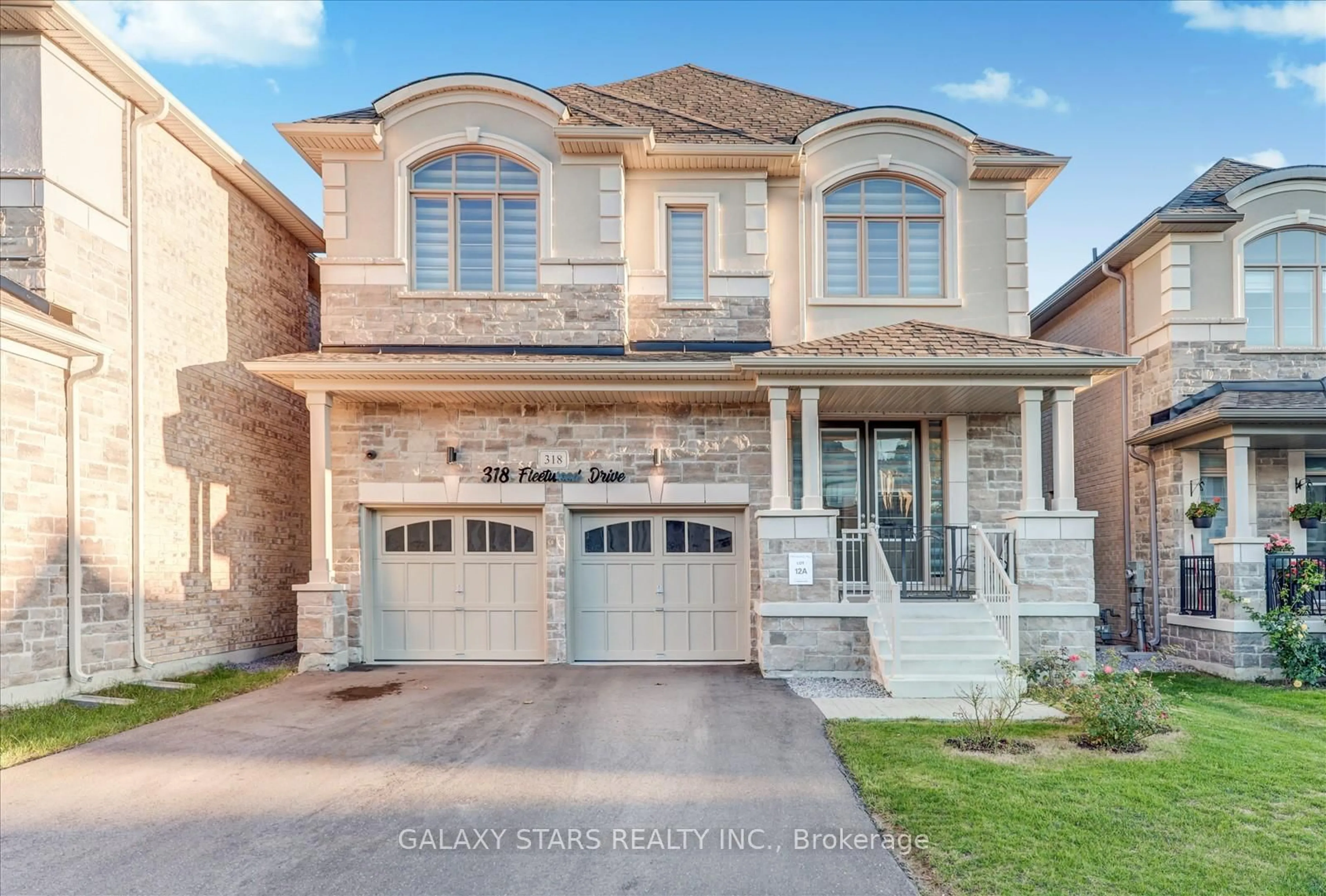 Home with brick exterior material, street for 318 Fleetwood Dr, Oshawa Ontario L1K 3G2