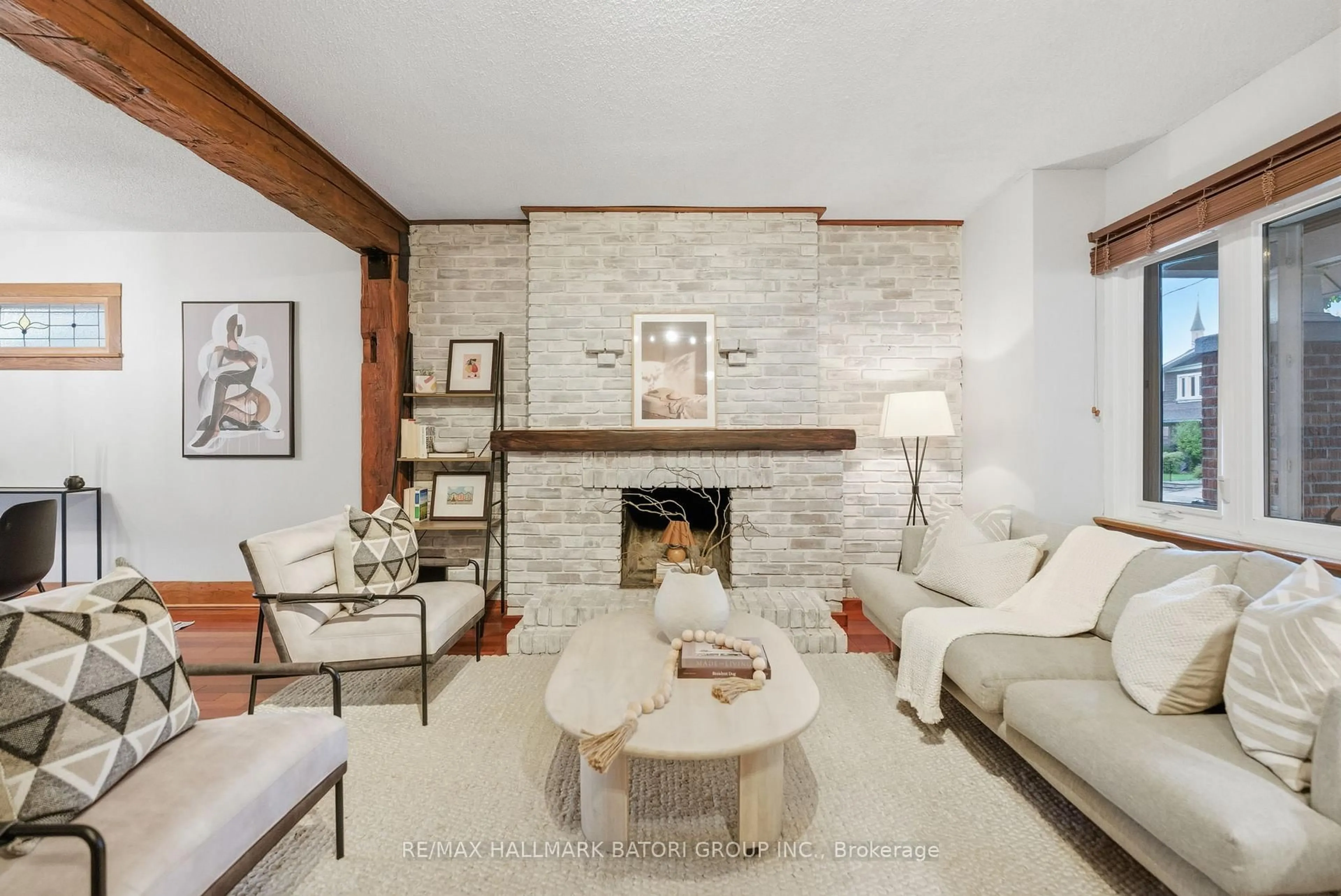 Living room with furniture, ceramic/tile floor for 249 Glebeholme Blvd, Toronto Ontario M4J 1T1