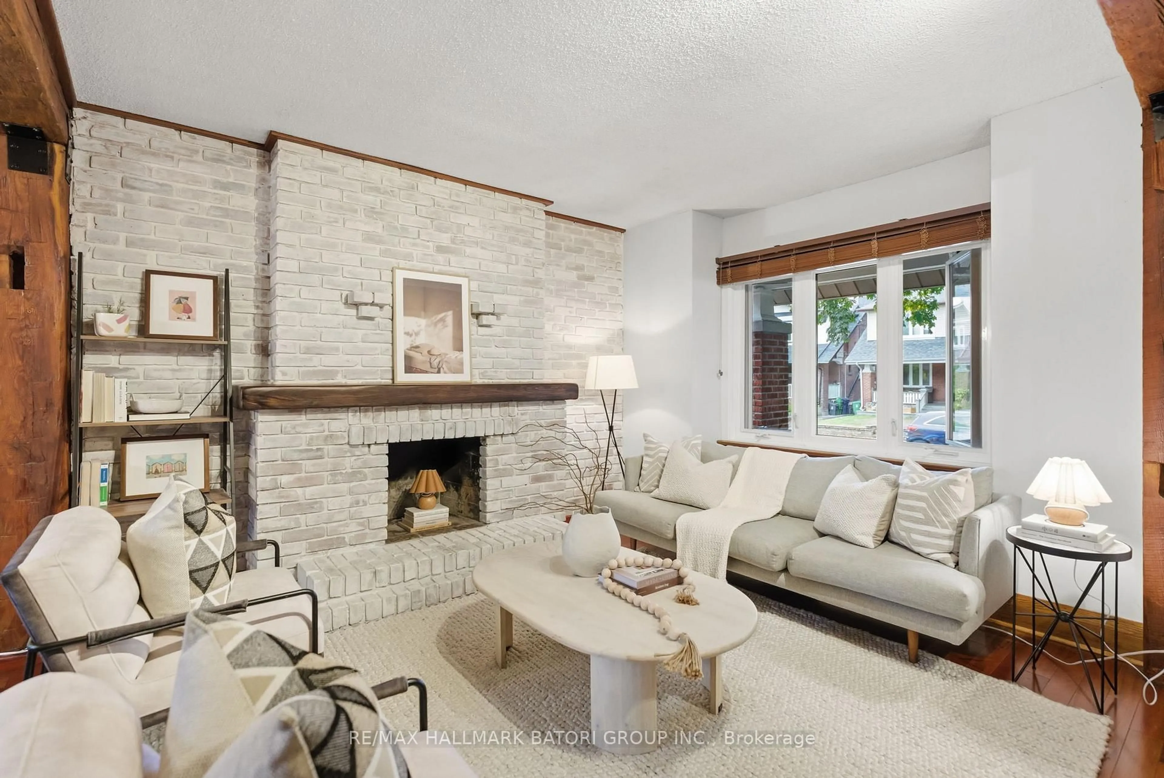 Living room with furniture, ceramic/tile floor for 249 Glebeholme Blvd, Toronto Ontario M4J 1T1