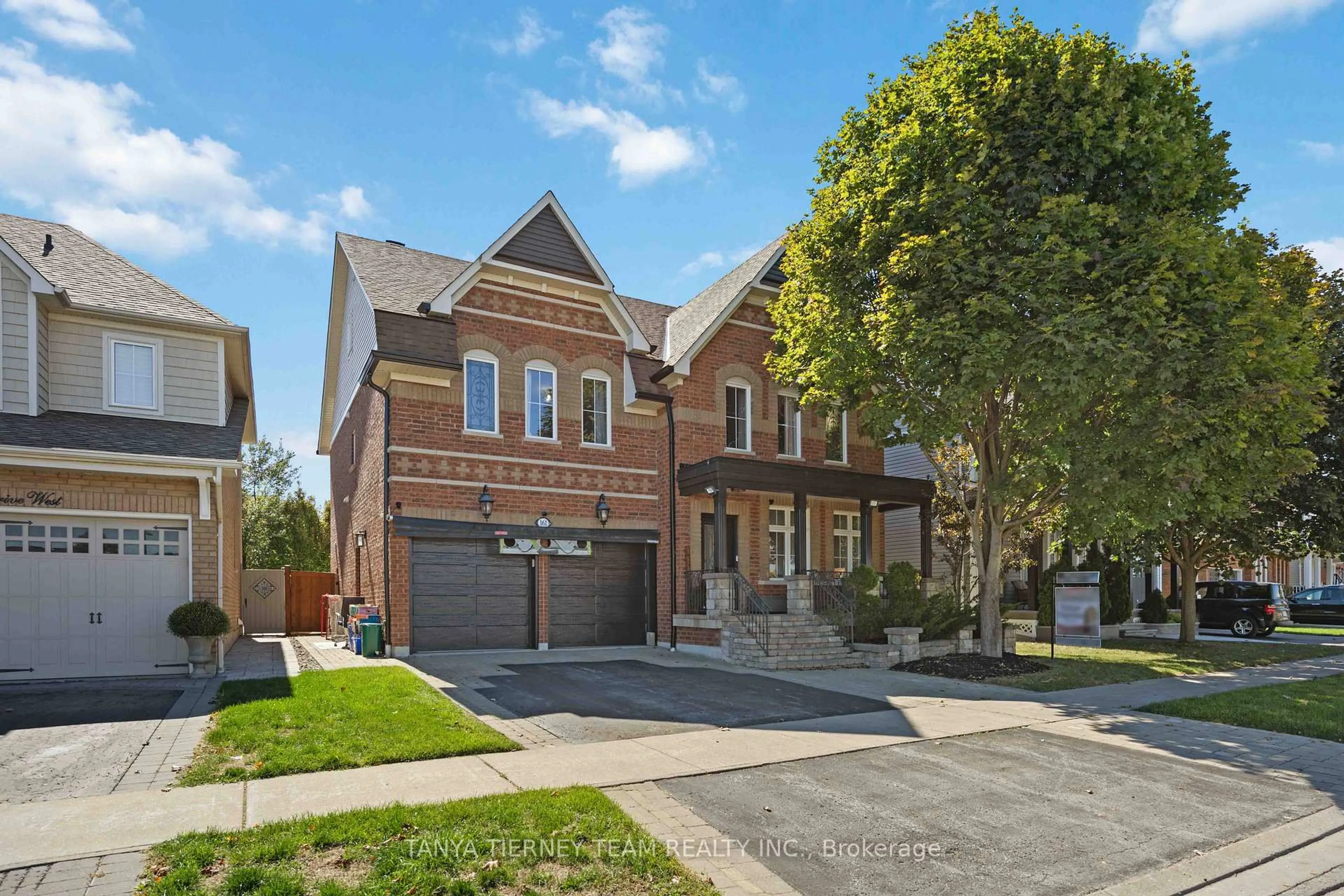 Home with brick exterior material, street for 161 Carnwith Dr, Whitby Ontario L1M 2J5