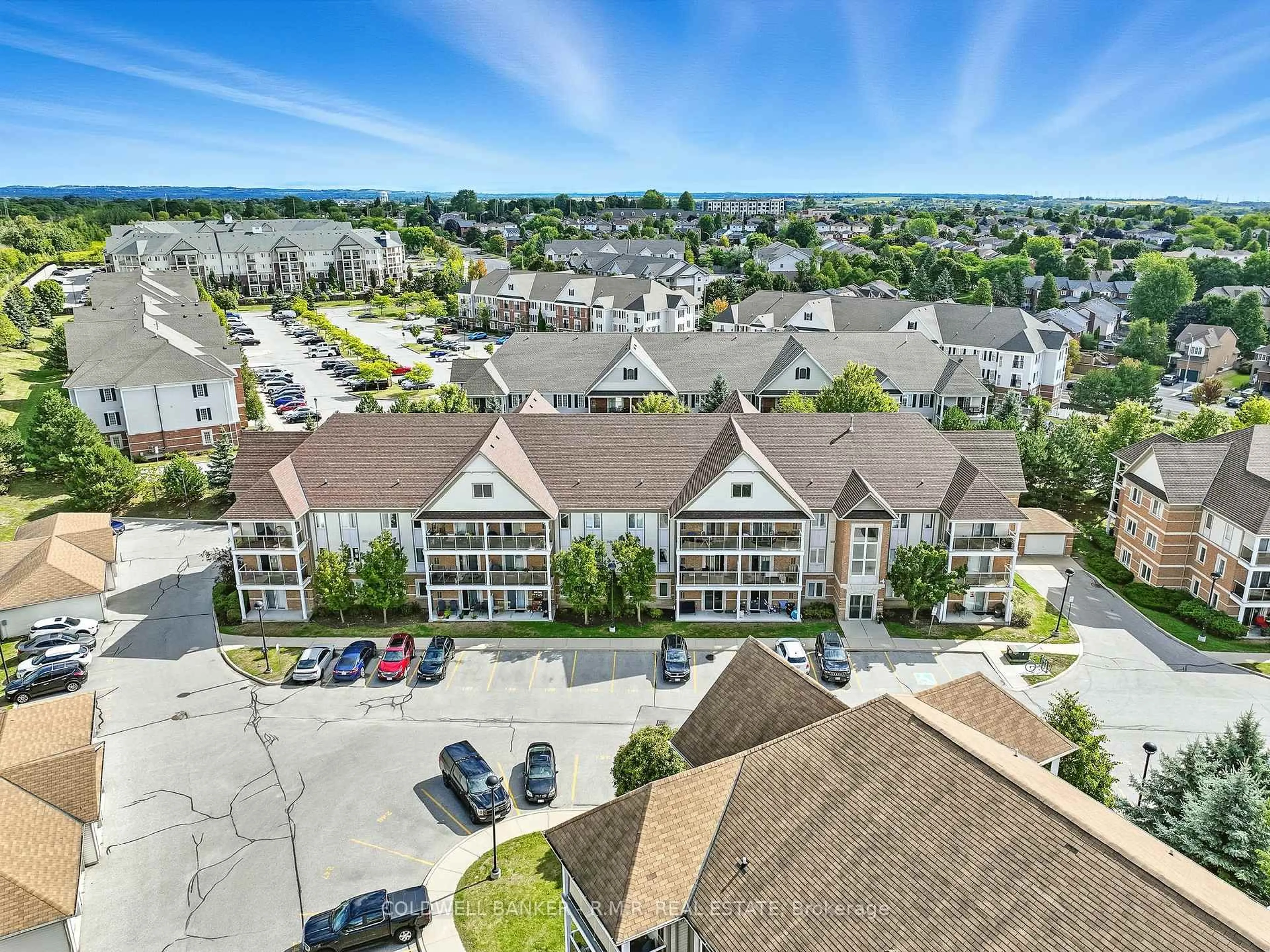 A pic from outside/outdoor area/front of a property/back of a property/a pic from drone, mountain view for 124 Aspen Springs Dr #310, Clarington Ontario L1C 0G8