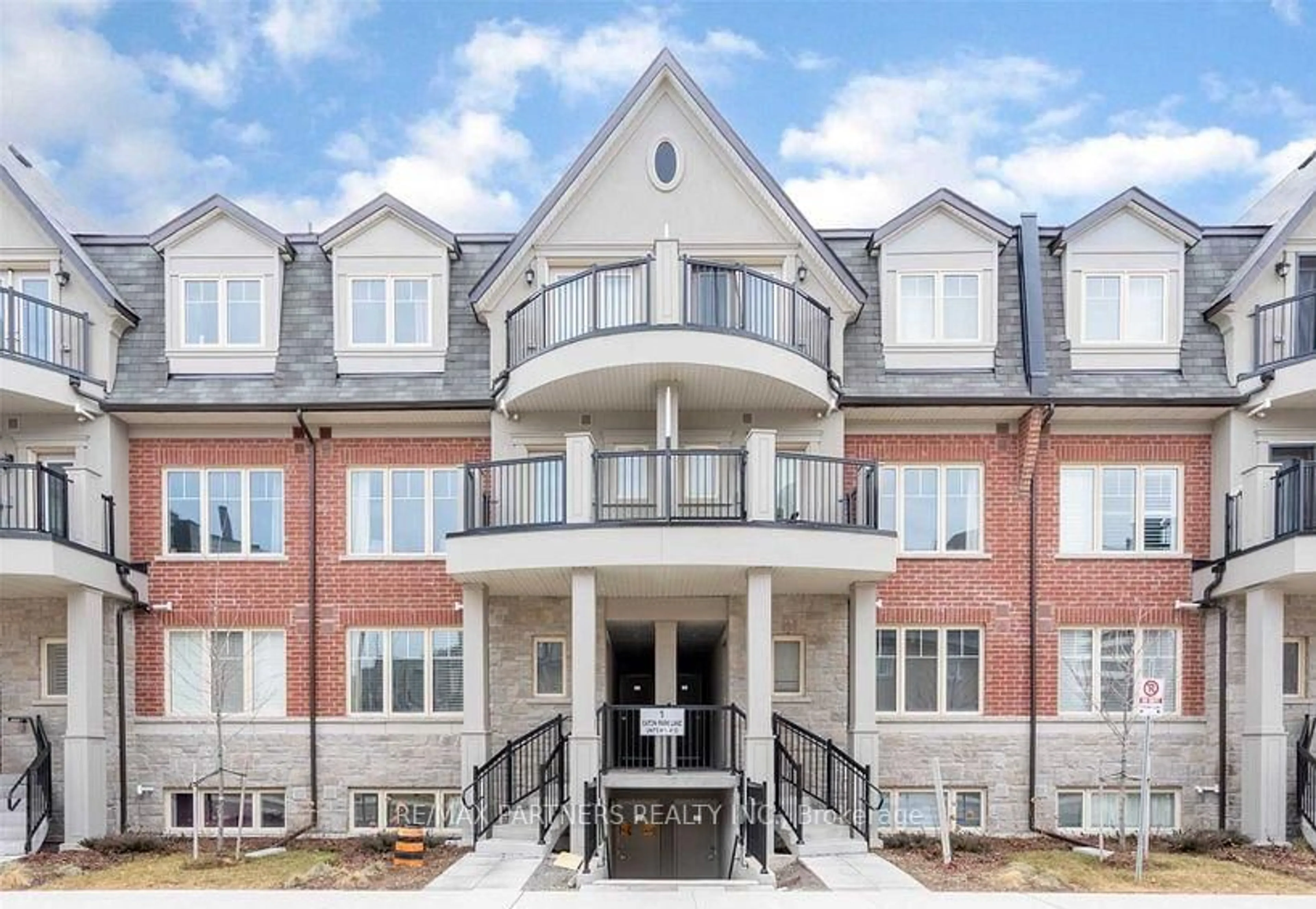 Home with brick exterior material, building for 1 Eaton Park Lane #9, Toronto Ontario M1W 0A5