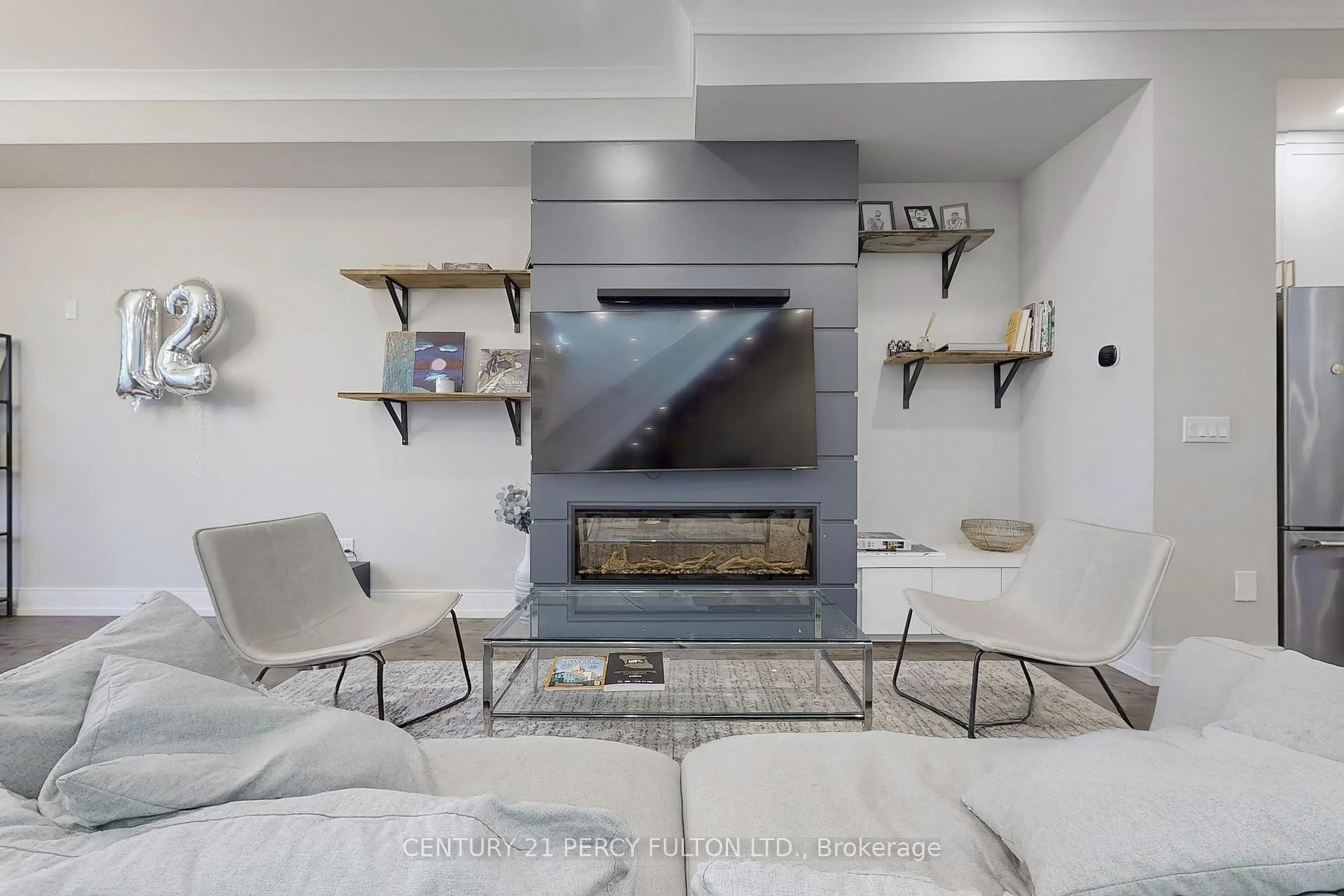 Living room with furniture, unknown for 84 Wiley Ave, Toronto Ontario M4J 3W6