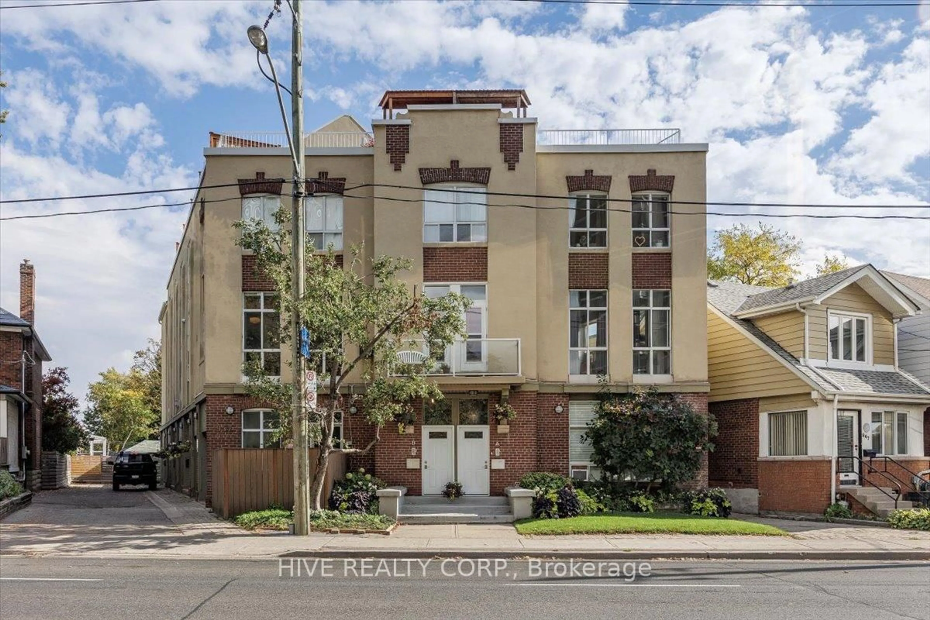 Home with brick exterior material, street for 957 Broadview Ave #D, Toronto Ontario M4K 2R5