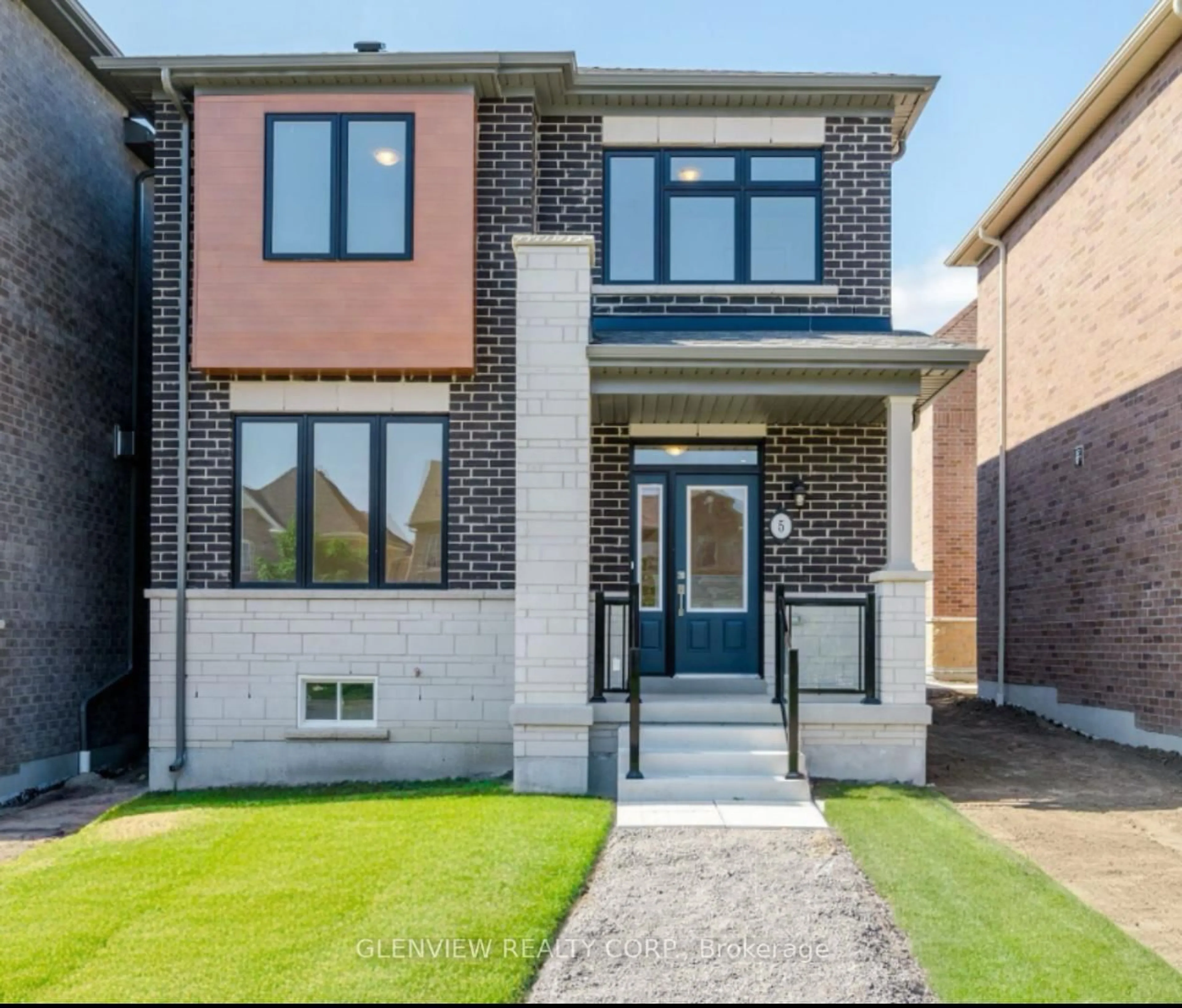 Home with brick exterior material, street for 5 Mountainside Cres, Whitby Ontario L1R 0P5