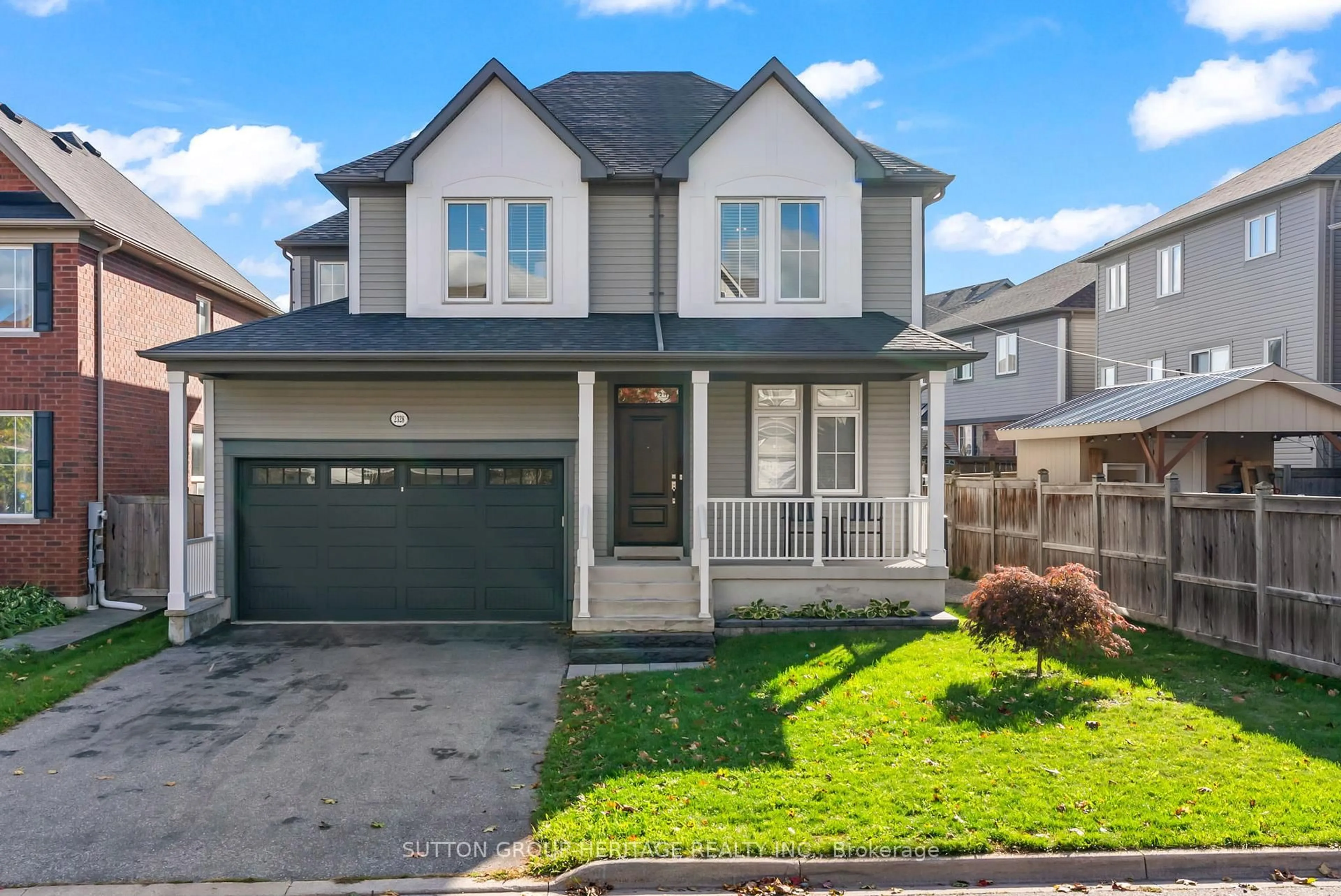Home with vinyl exterior material, street for 2328 Pilgrim Sq, Oshawa Ontario L1L 0C2