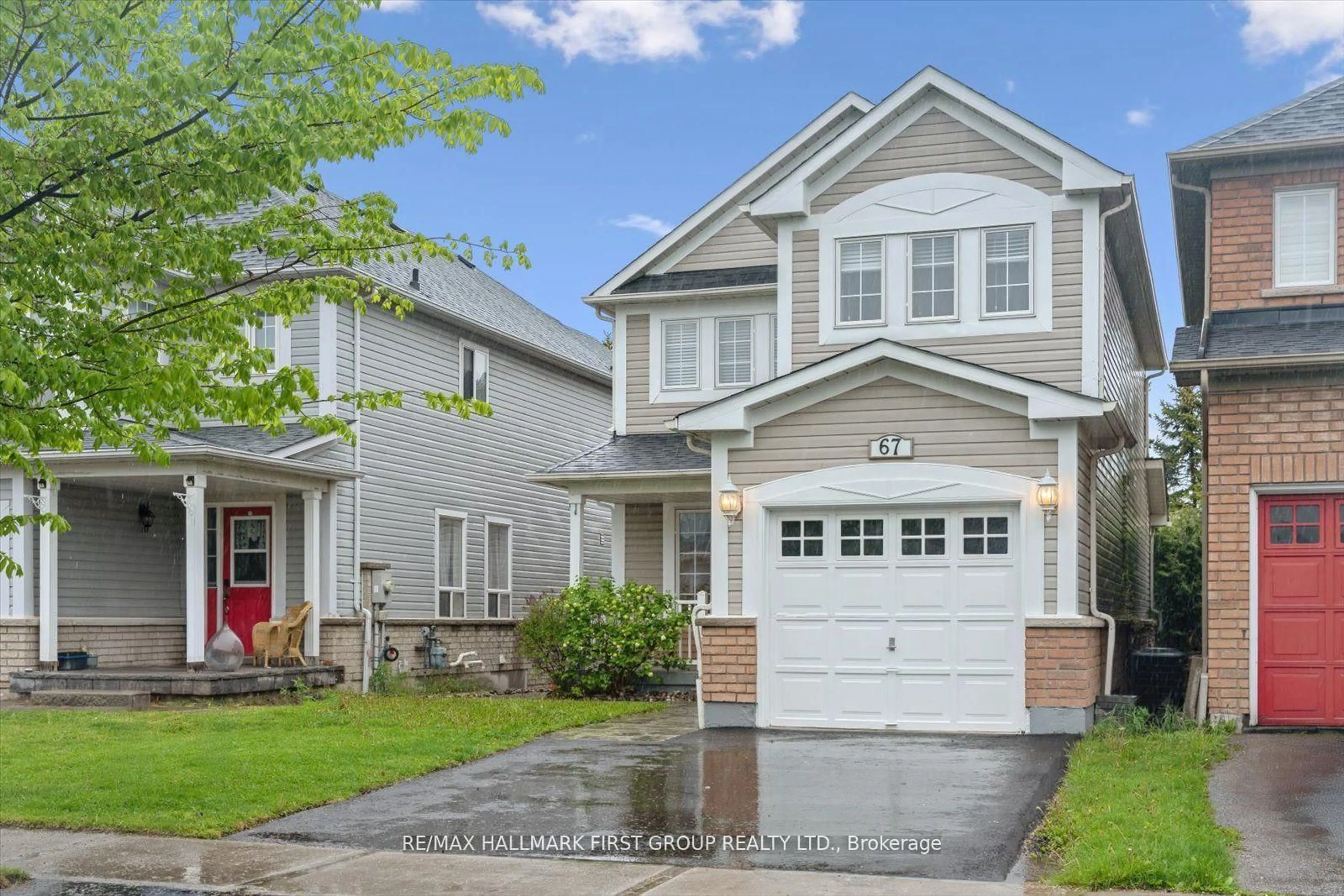 Home with vinyl exterior material, street for 67 Tallships Dr, Whitby Ontario L1N 9X7