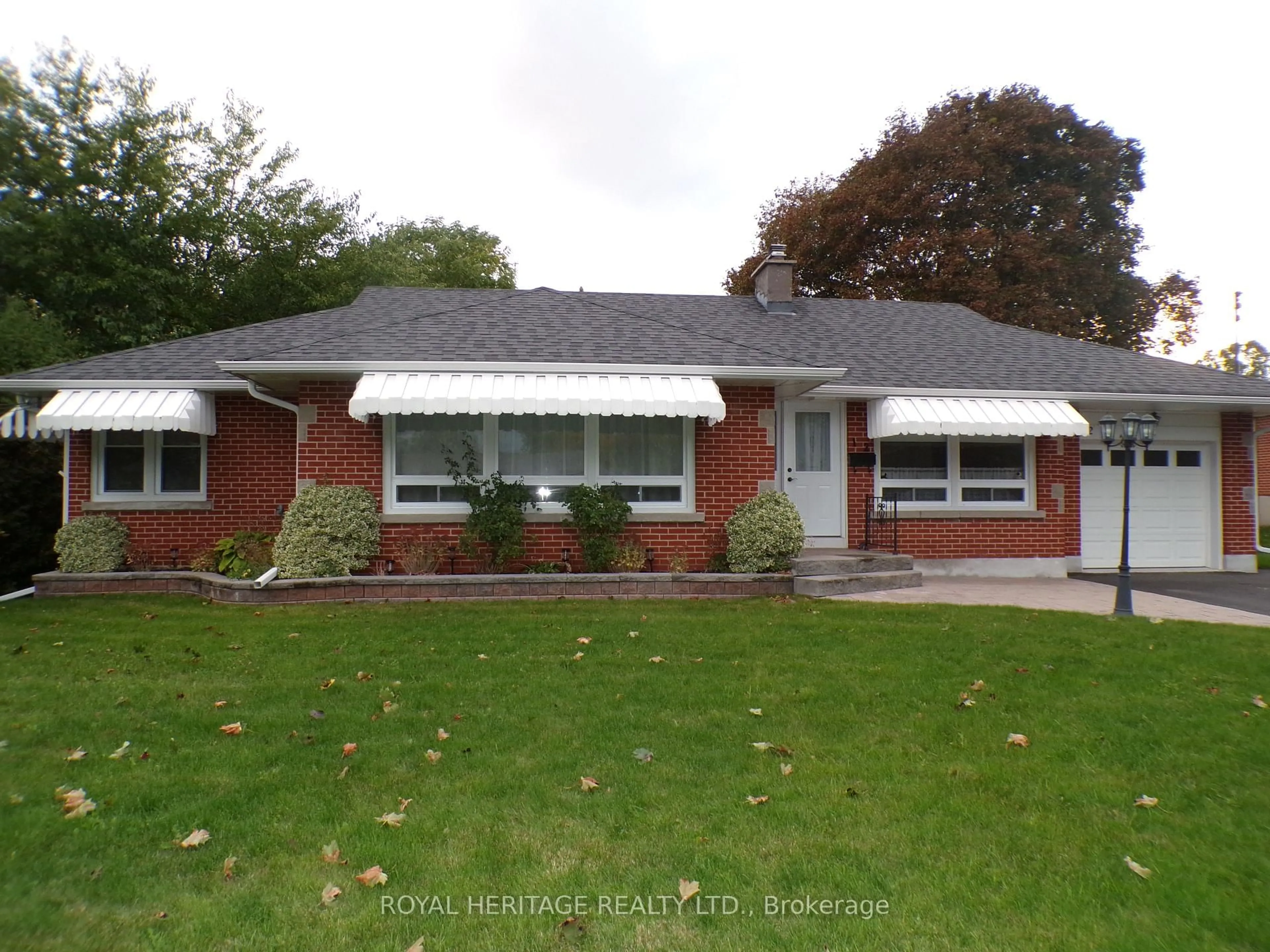 Home with brick exterior material, street for 12 Darlington Blvd, Clarington Ontario L1E 2J7